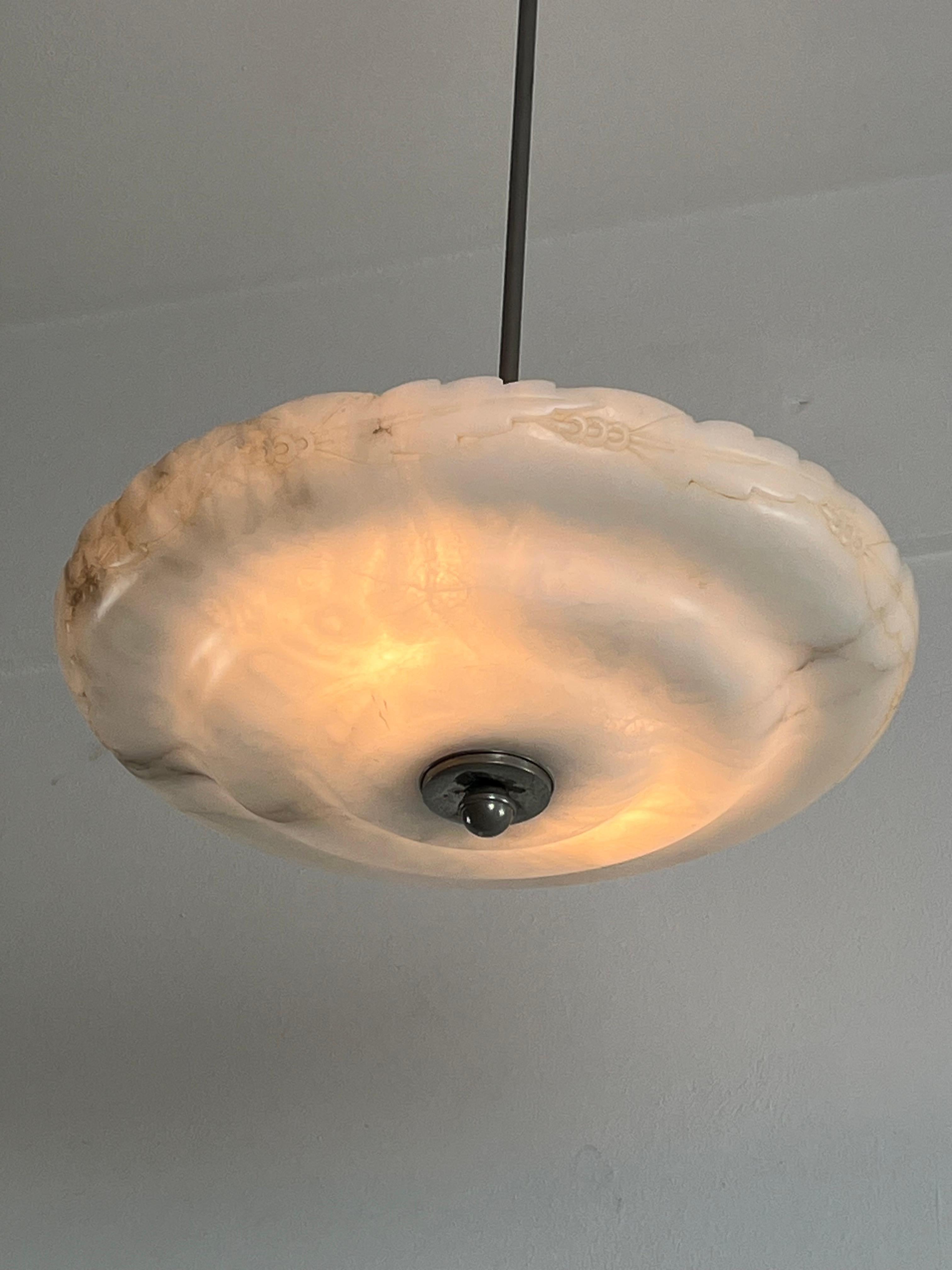 Mid-century Italian alabaster chandelier, 1940s
2-lights, E27 lamps.
Good condition, small signs of aging.
Metal structure.
Diameter 44 cm, height 85 cm