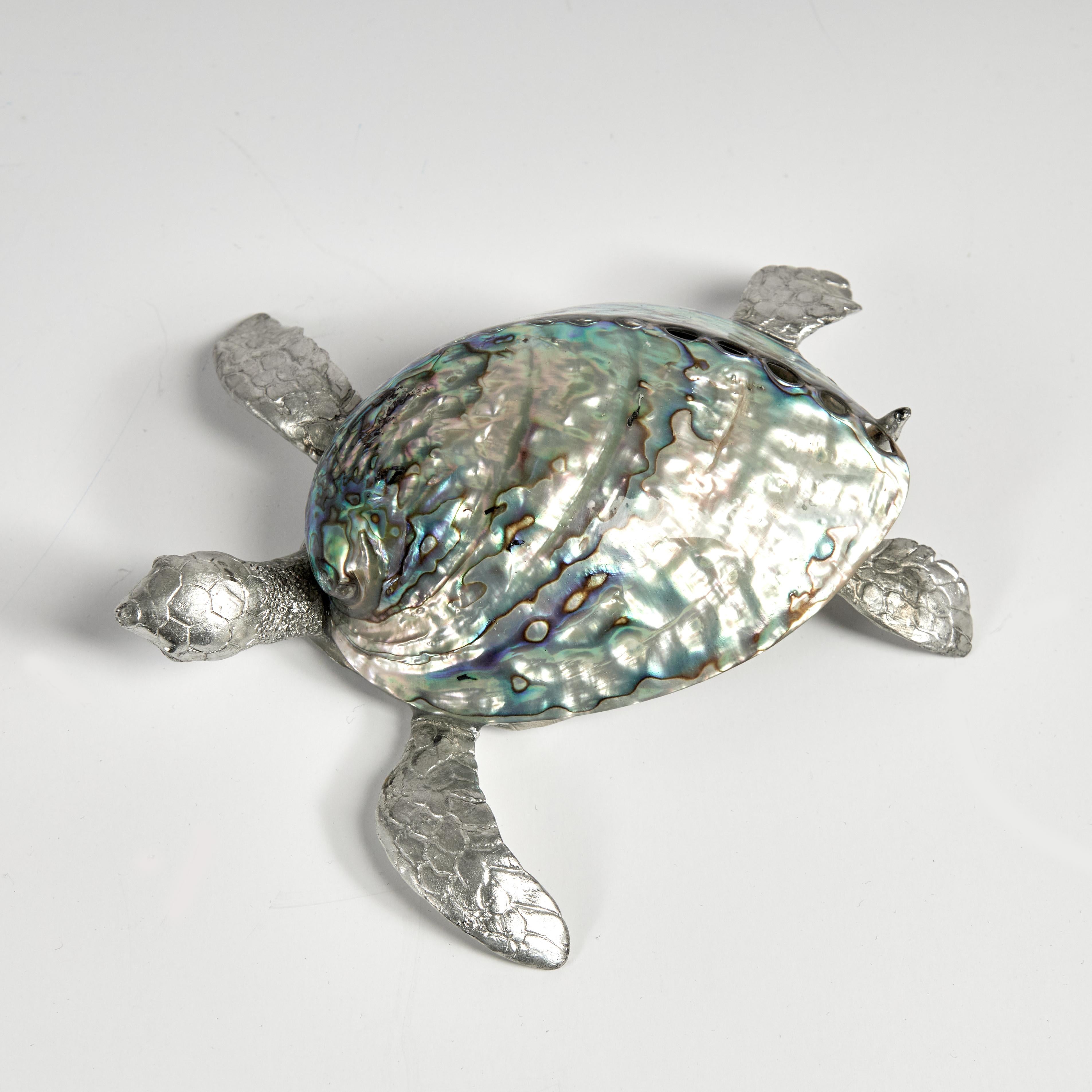 Vintage Italian turtle sculpture or object of art crafted in cast aluminum featuring an abalone shell with its iconic iridized color variations.