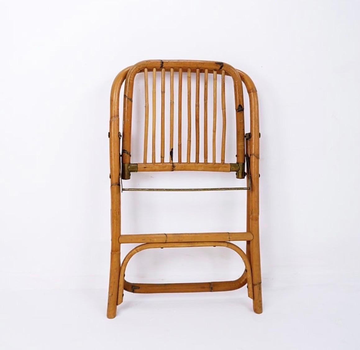 Mid-Century Italian Bamboo Dal Vera Folding Chair, 1960s

Wear consistent with age and use

Wabi Sabi - Vintage - Decoration
Handmade folding chair in perfectly proportioned curved bamboo.  Measures : 53cmx44cm H:72cm SH:46cm 
Materials: Bamboo -