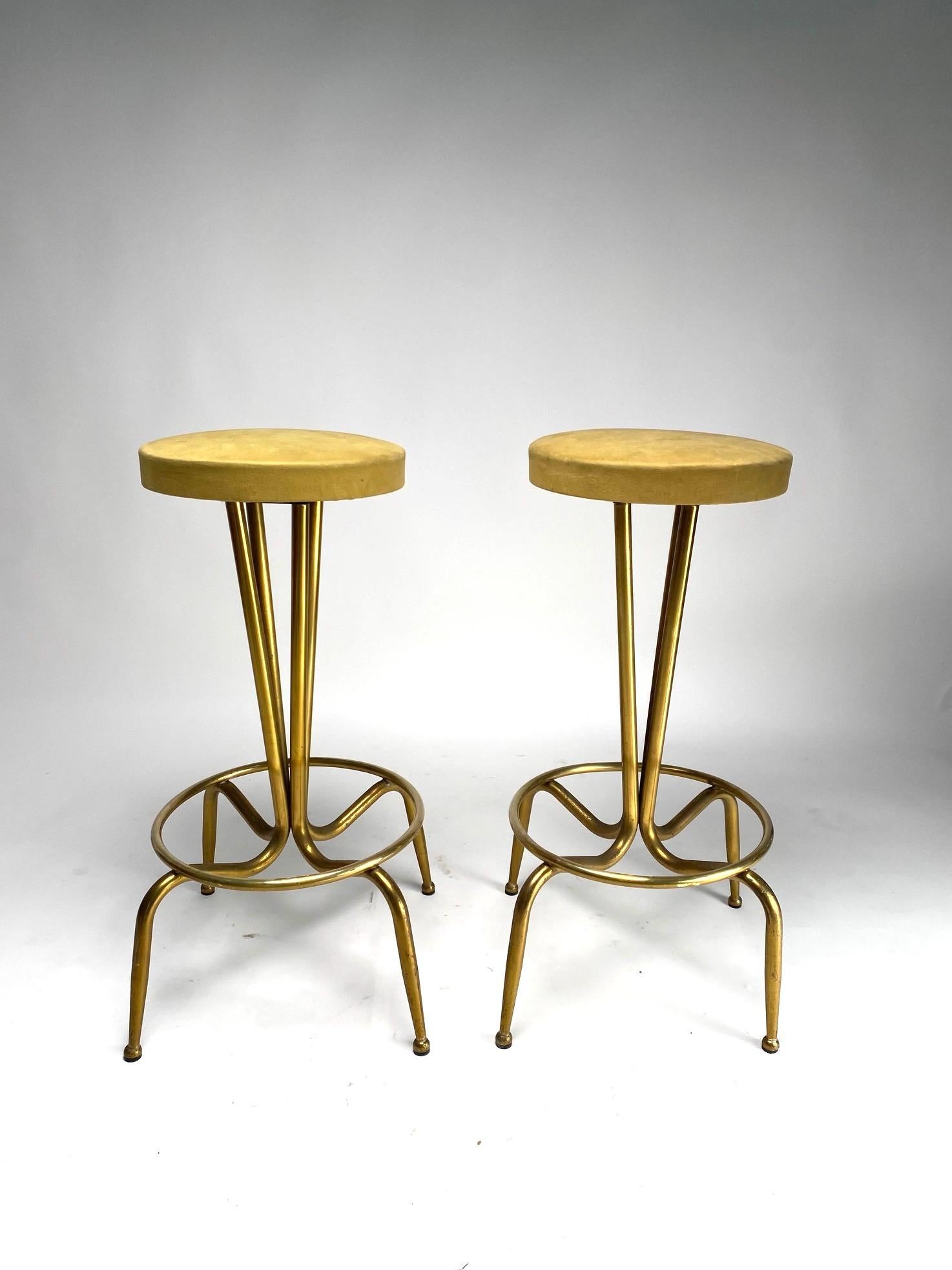 Refined pair of midcentury Italian bar stools, brass structure and original fabric. 1950s

A pair of organic stools of great executive quality, coming from an important house in the heart of the old city of Bologna (Italy)

We preferred to keep the