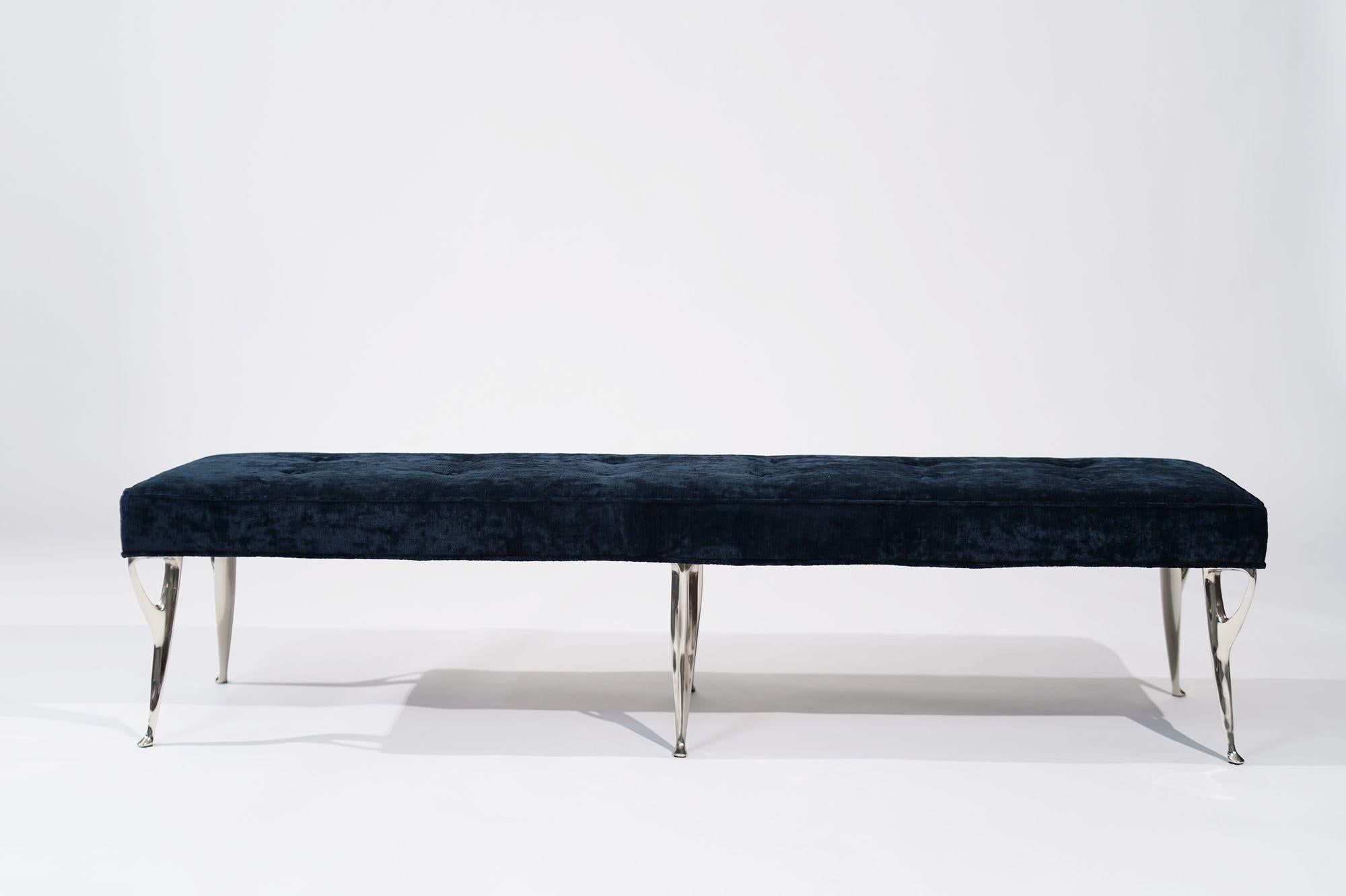 Mid-Century Italian Bench, an exquisite piece hailing from the 1950s, meticulously restored by Stamford Modern. Reimagined in sumptuous navy blue chenille upholstery, the bench exudes opulence and sophistication. The sculptural nickel legs, expertly