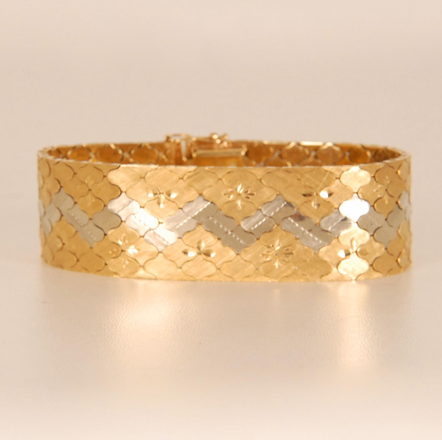 18k Yellow and White gold flexible mesh bracelet. 
expertly crafted with an intricate honeycomb / beehive pattern of yellow and white gold creating two-color unique geometric design.
Each link was made entirely by hand by Italian master jewelers,