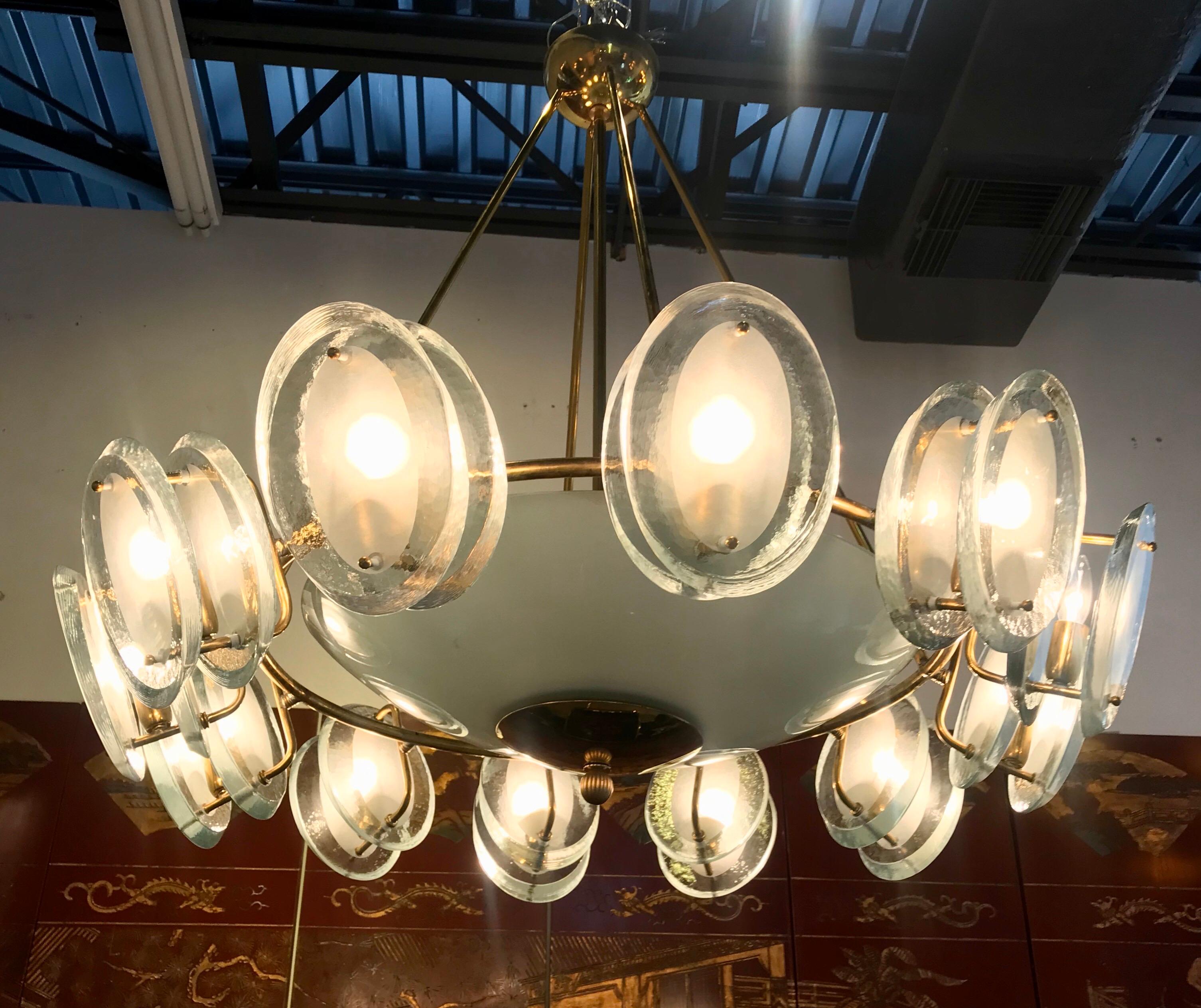 A beautiful glass and brass chandelier designed by Max Ingrand for Fontana Arte.