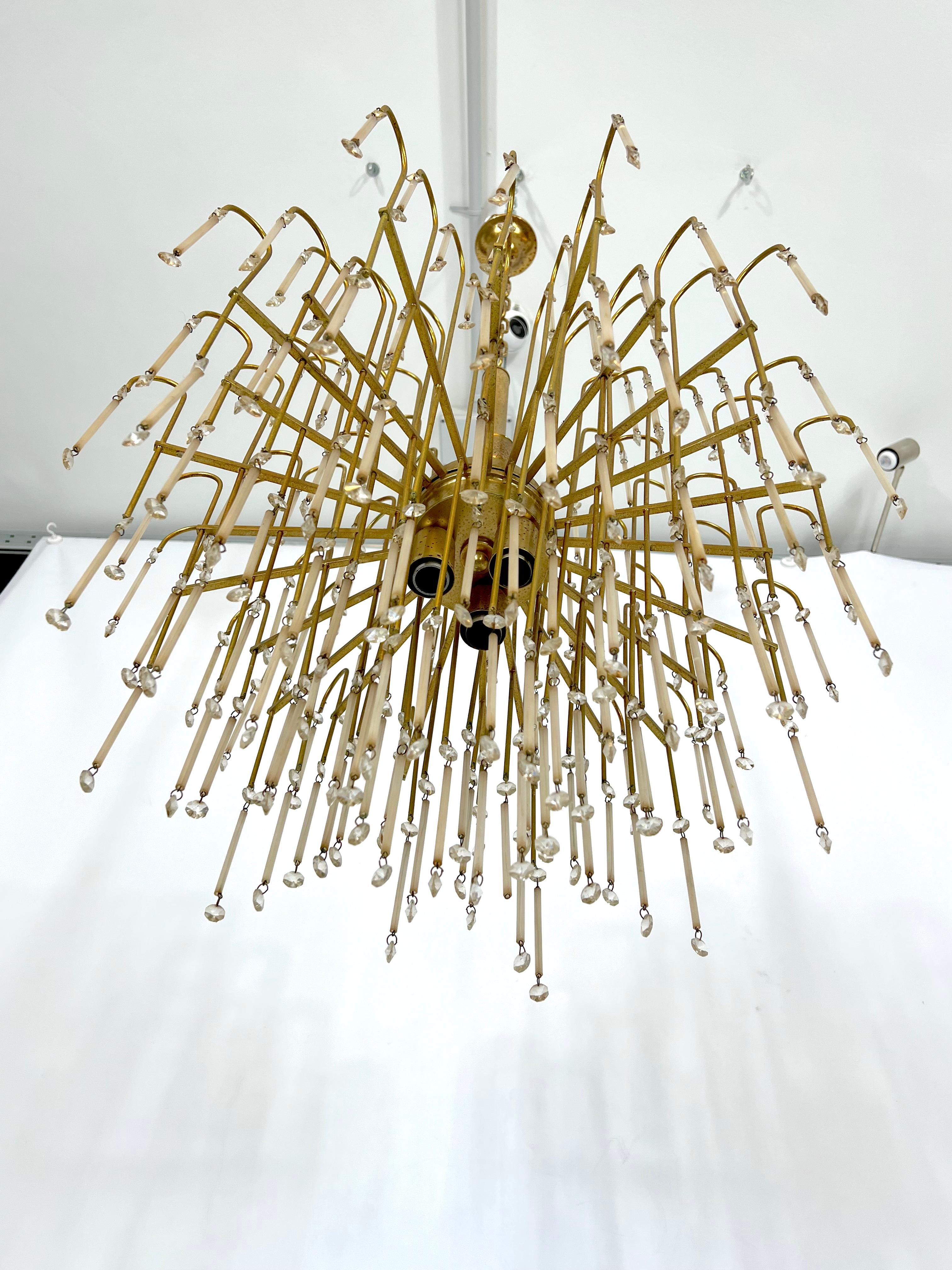 20th Century Mid-century, Italian brass and glass chandelier from 70s For Sale