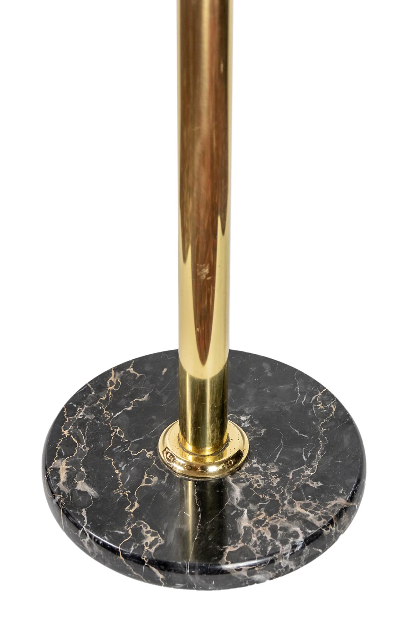 Midcentury Italian coat rack/stand is made of brass with round form marble base.
   