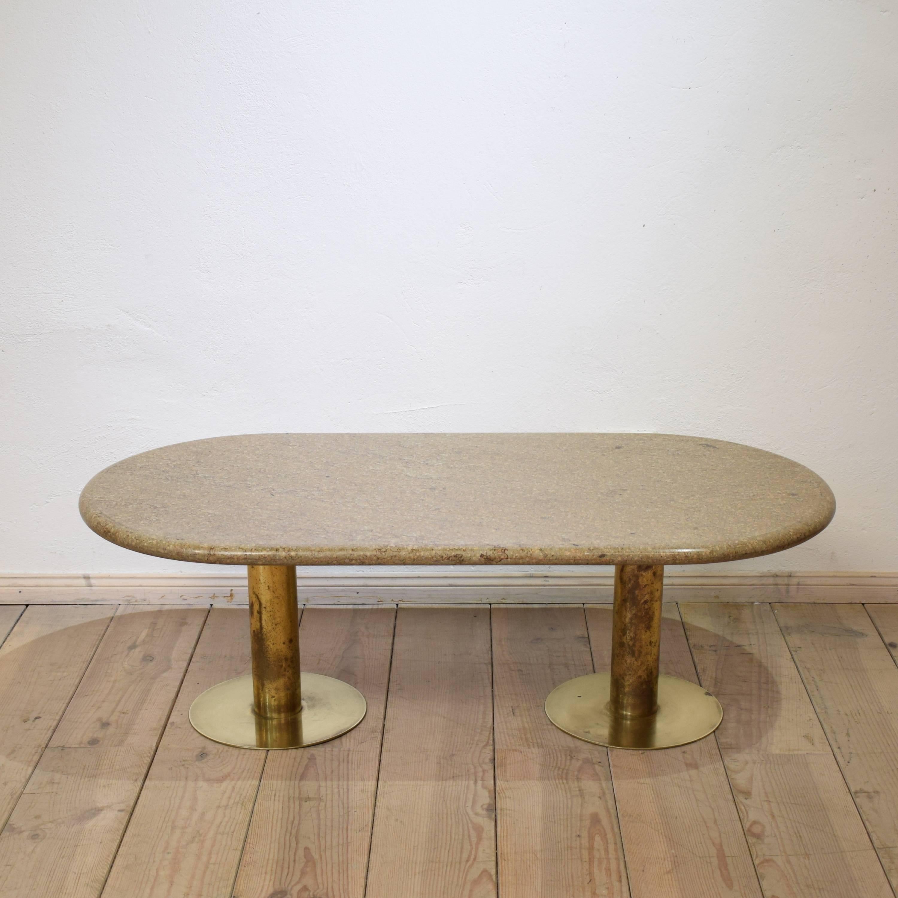 This rare midcentury Italian brass and marble side table from circa 1968 is very beautiful in color and shape. With the round corners and the two round brass legs it gives the table a very elegant and unique looking.
A great table which fits to a