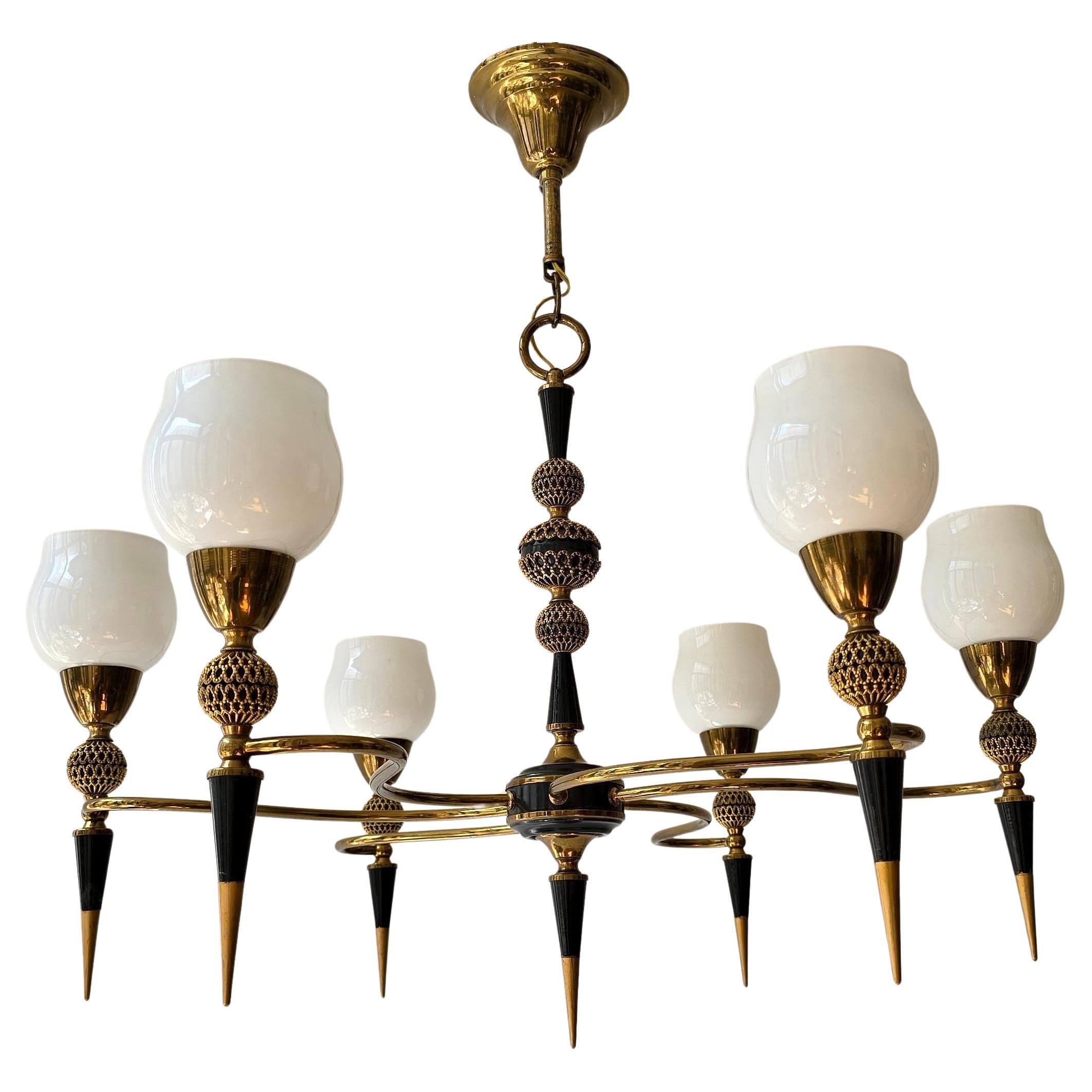 Mid-Century Italian Brass and Opaline Glass Six-Light Chandelier, 1950s

Elegant and sculptural Italian chandelier from the 1950s–1960s, featuring six upward-facing tulip-shaped opaline glass shades mounted on finely detailed brass arms. Each arm is