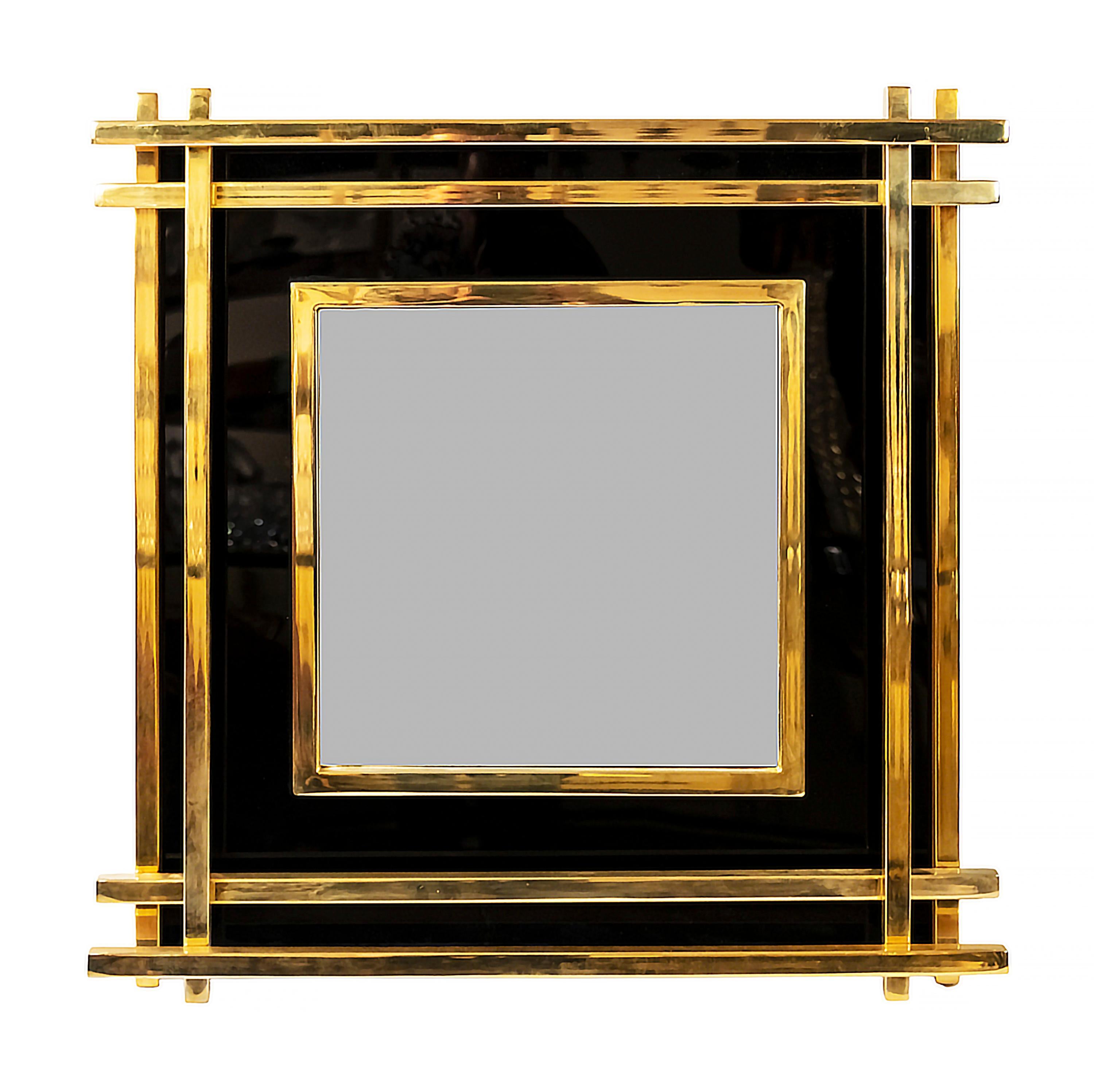 Italian midcentury brass and plexiglass frame wall mirror from 1970s.



.