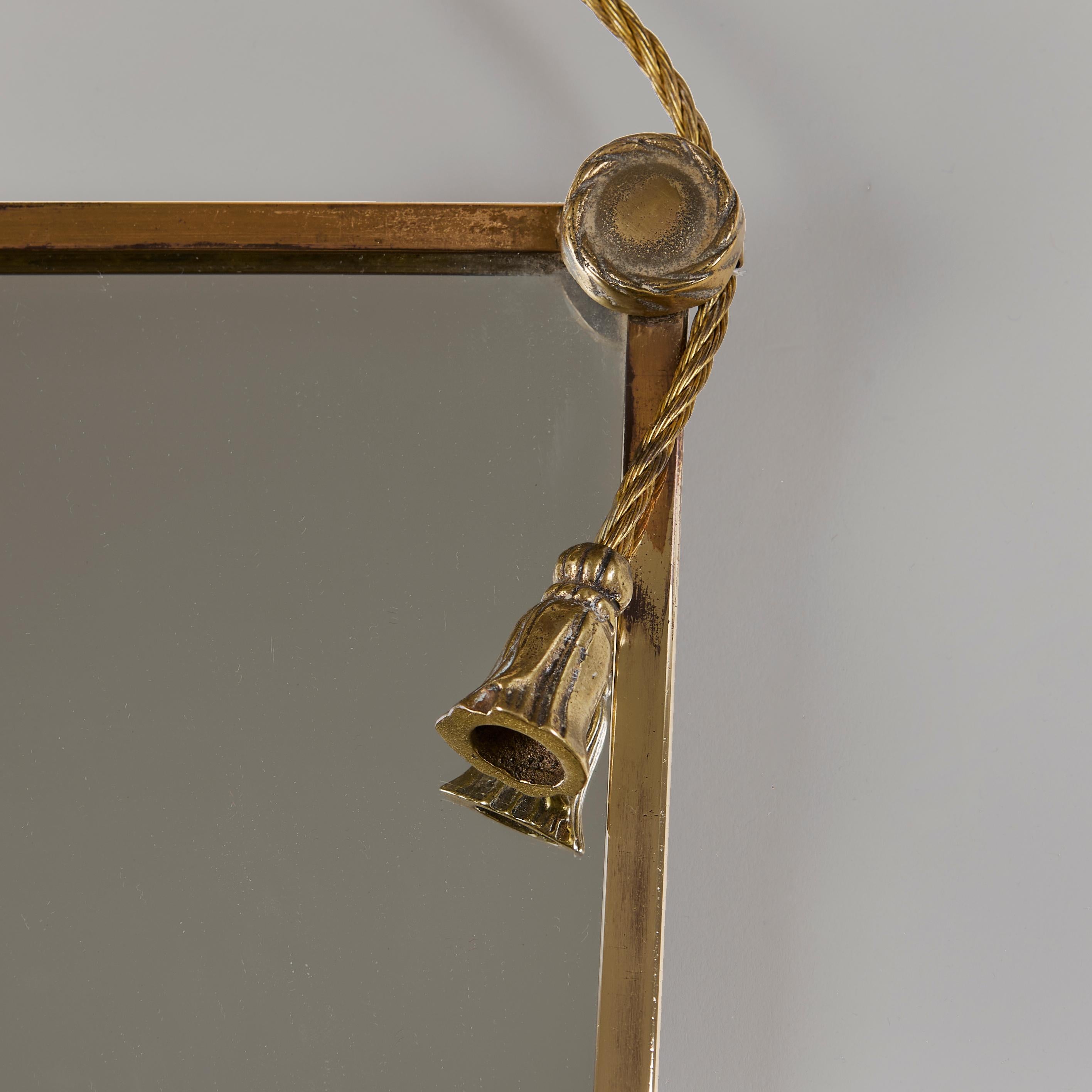 Mid-20th Century Italian brass bow and tassels mirror. mid-century For Sale