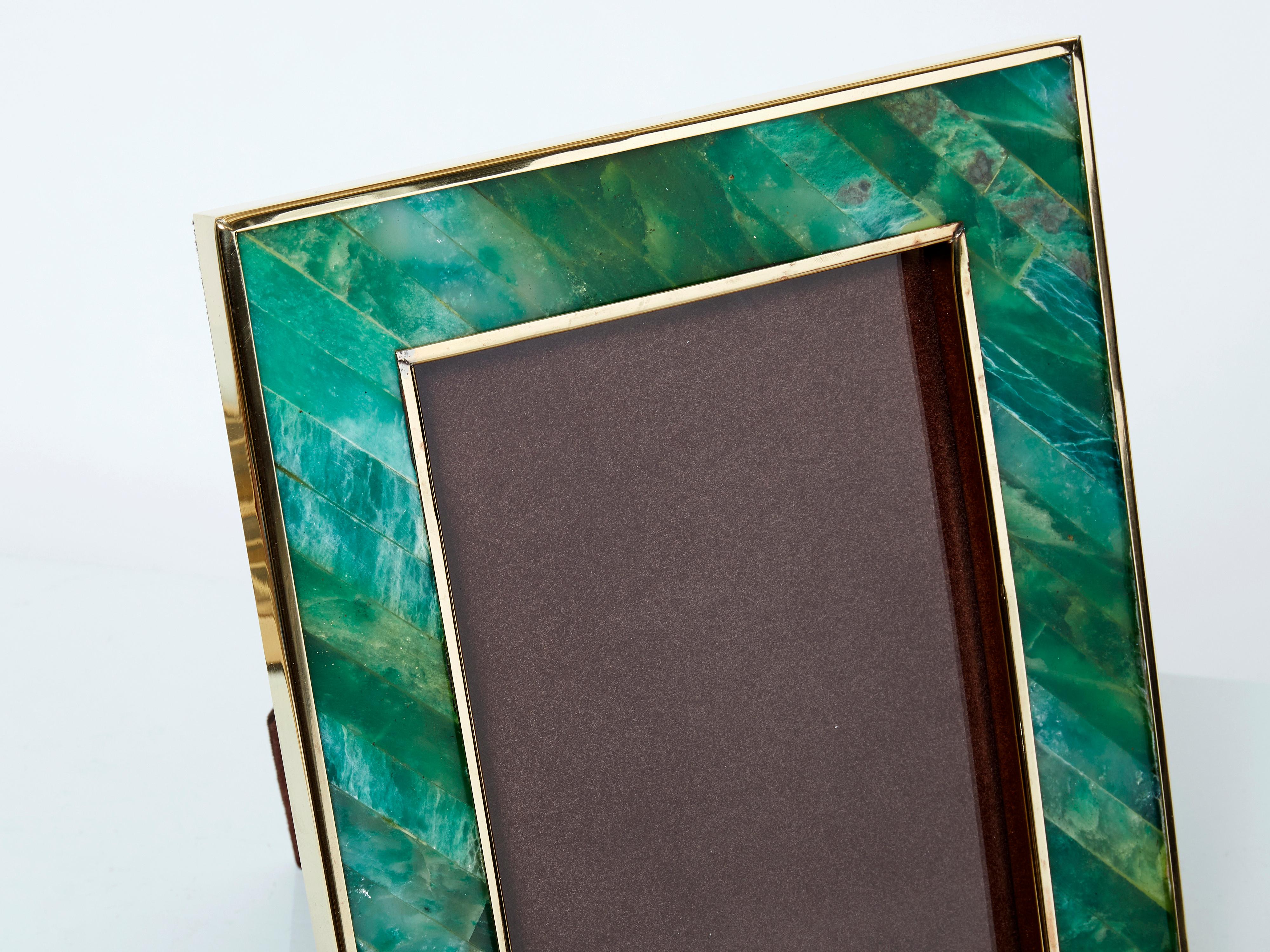 Beautiful mid-century picture frame made in Italy in the late 1970s. This brass frame is covered by malachite marquetry, with brown velvet on the back. The mix of brass and malachite is really nice, and typical of the lavish 1970s Italian style. A