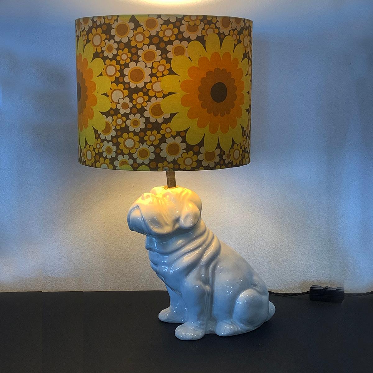 Italian Bulldog Lamp in the Fornasetti style with bright, Original Shade, in excellent condition. The Bulldog is perfect and strong as new, but it has had a minor “invisible” repair in the past at sometime, but this is described only to be exact in