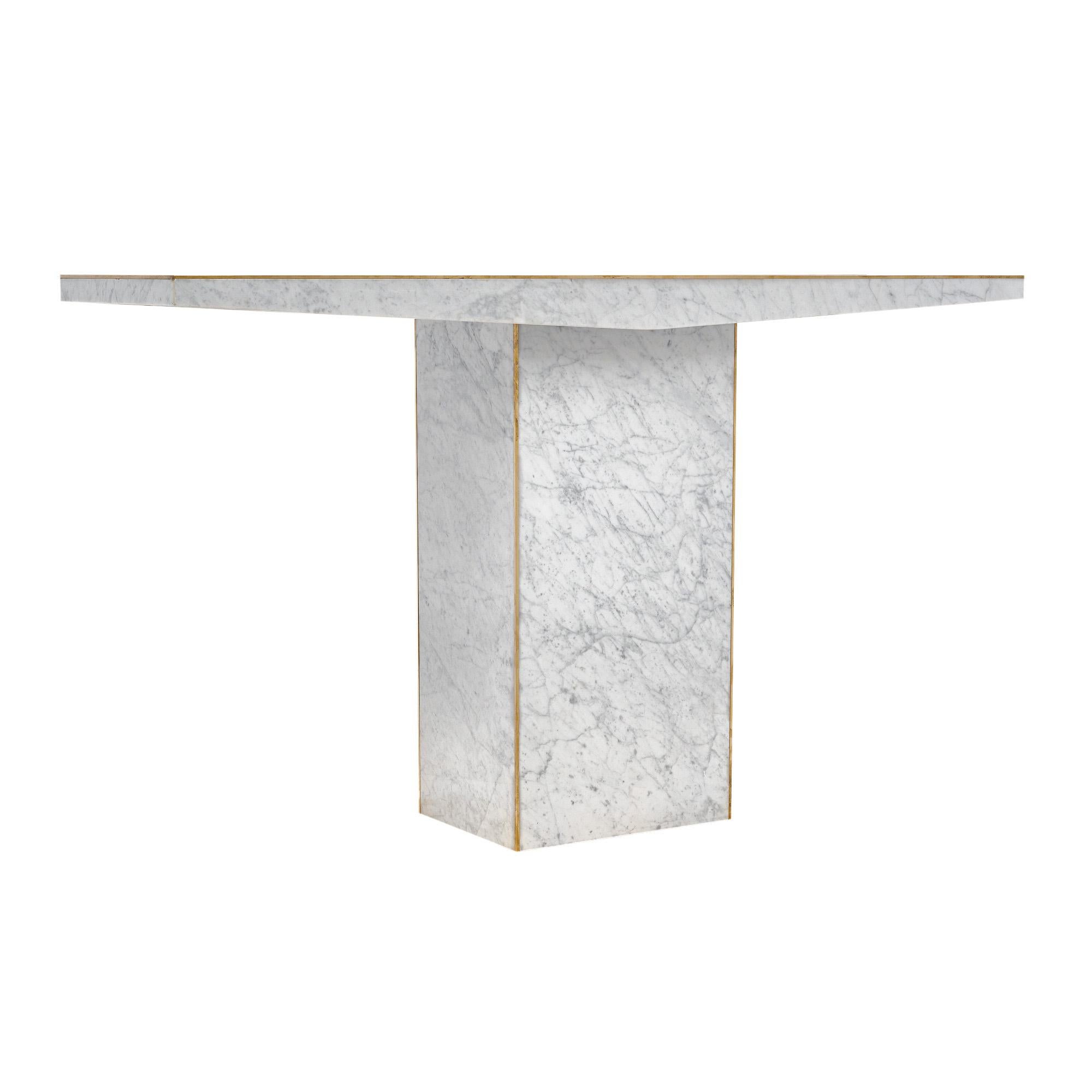 Pair of console tables from Italy in the mid-century style. Each table has a rectangular base with a stylized one piece Carrara slab top. Brass trim can be found throughout for a glamorous touch. The price is for the pair, per piece they are priced