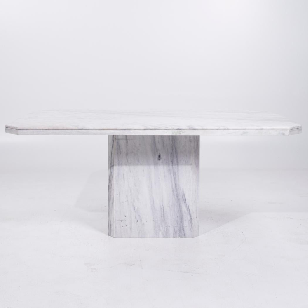 Mid Century Italian Carrara Marble Dining Table

This dining table measures: 70.75 wide x 39.5 deep x 30 inches high, with a chair clearance of 27.75 inches

All pieces of furniture can be had in what we call restored vintage condition. That means