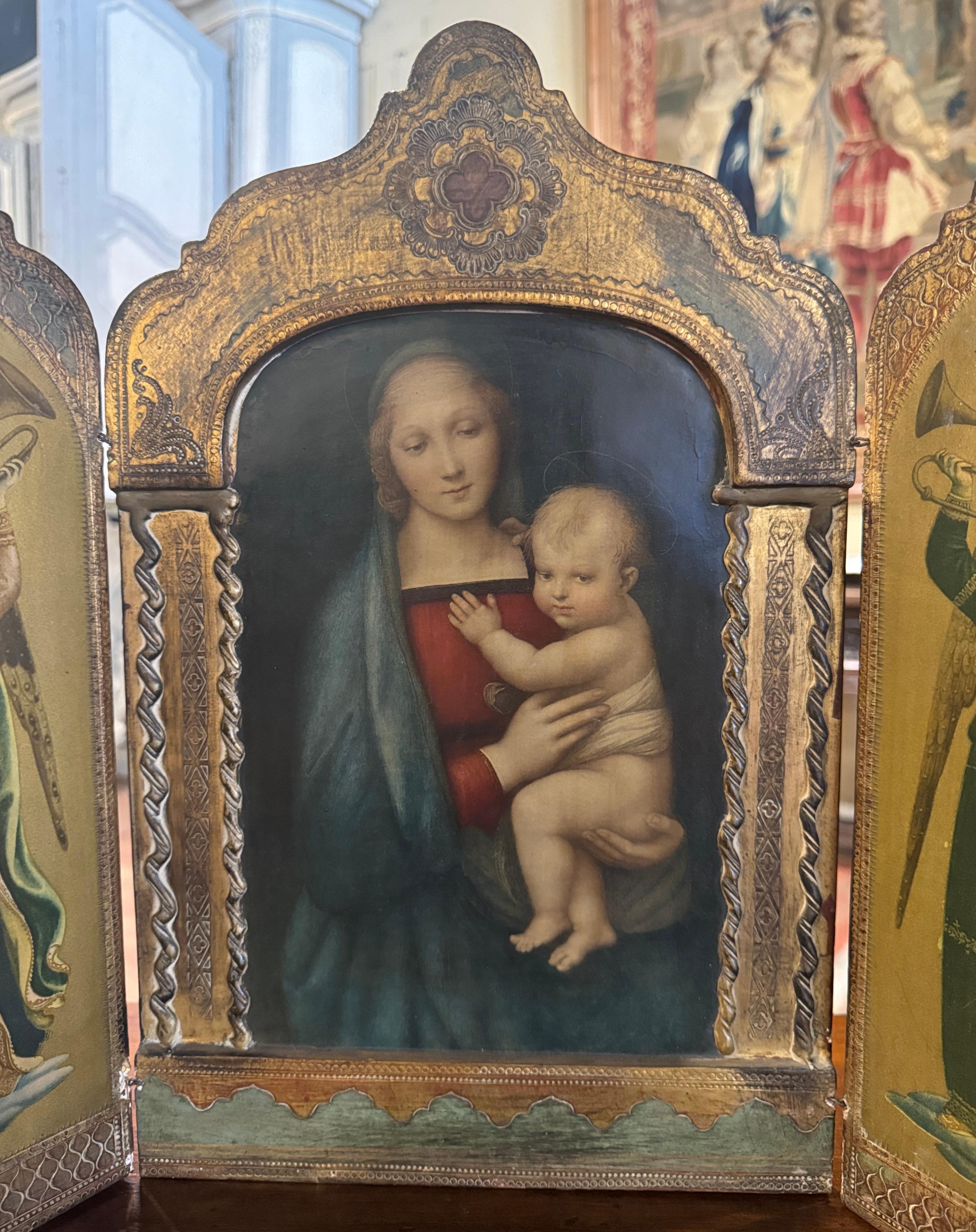 Place this antique triptych on a table for your daily devotions! Created in Italy circa 1960, and carved of pine wood, the religious artwork features three folding panels hinged together which can be folded shut or displayed open. The central panel