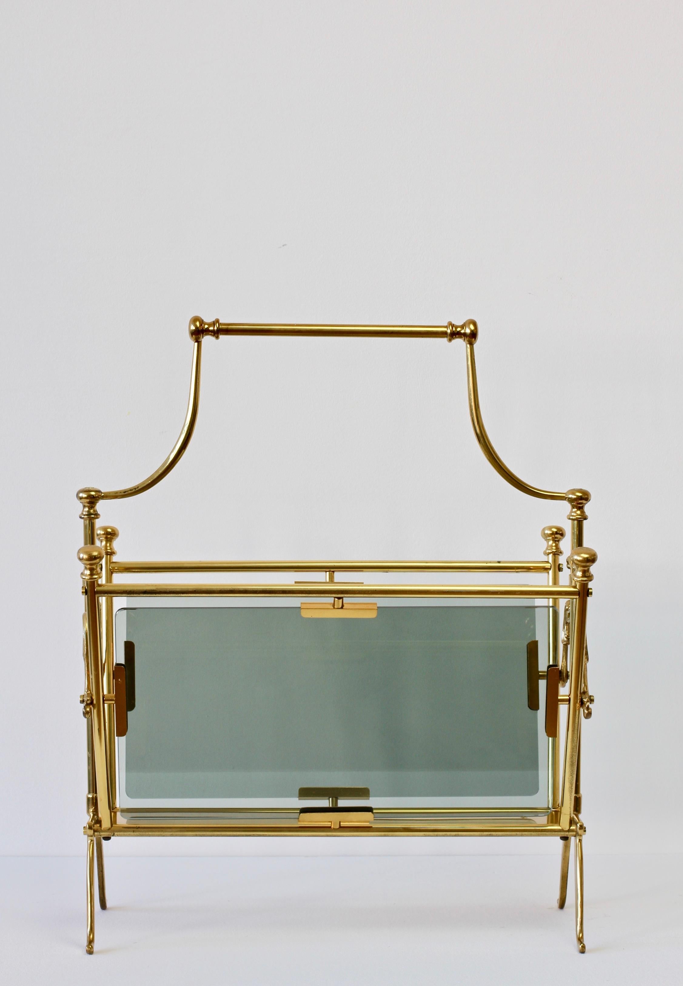 Brass and dark smoked toned glass magazine / newspaper / book rack, holder or stand, often attributed to Maison Jansen and Maison Baguès but, we have seen enough examples with labels showing that they were made in Italy and not, as some suggest,