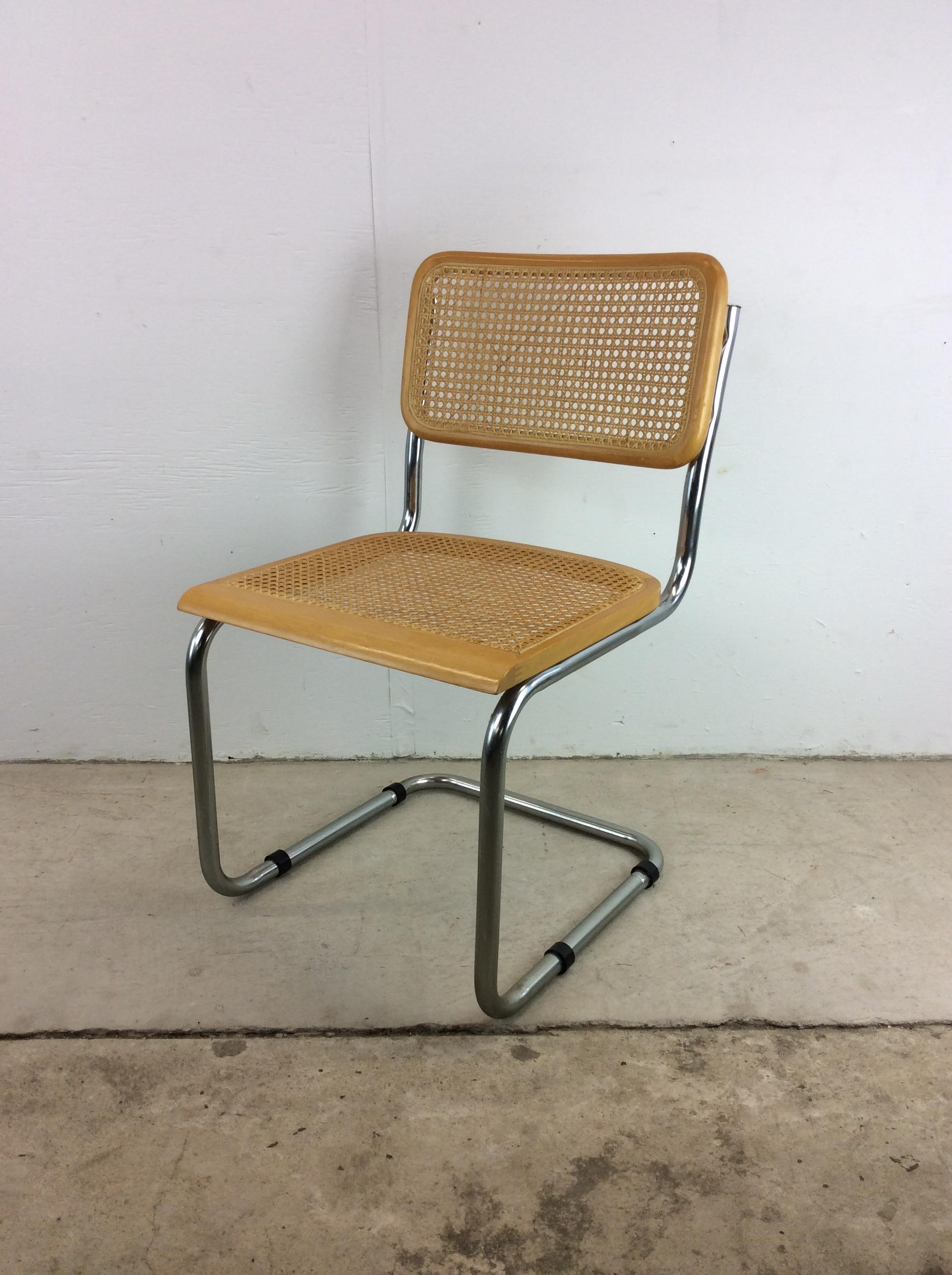 This mid century modern cesca style chair features caned seat & seat back on a chrome cantilever base in the style of Marcel Breuer. 
Dimensions: 18w 20d 32h 17.5sh

Condition: Original finish is in excellent condition.  Only minor scuffs, slight