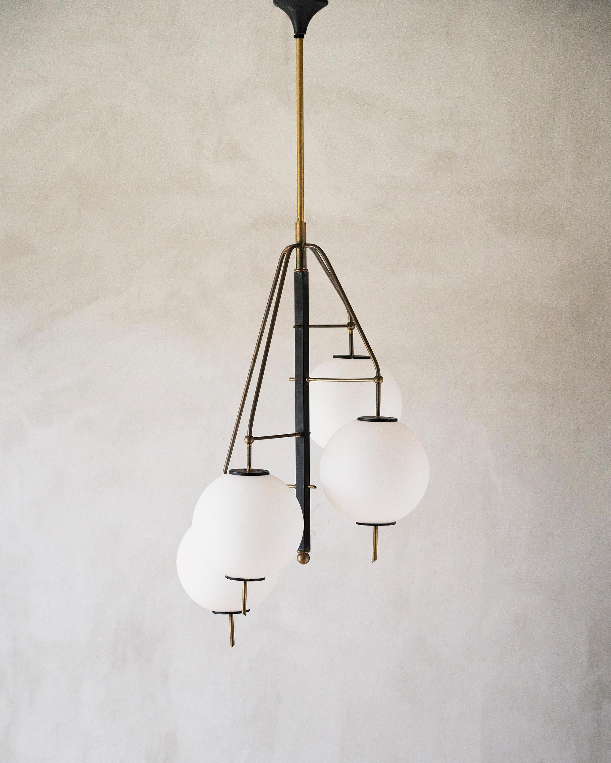 Italian mid century modern brass, metal and glass chandelier attributed to Stilnovo.  ca 1950s Italy. 