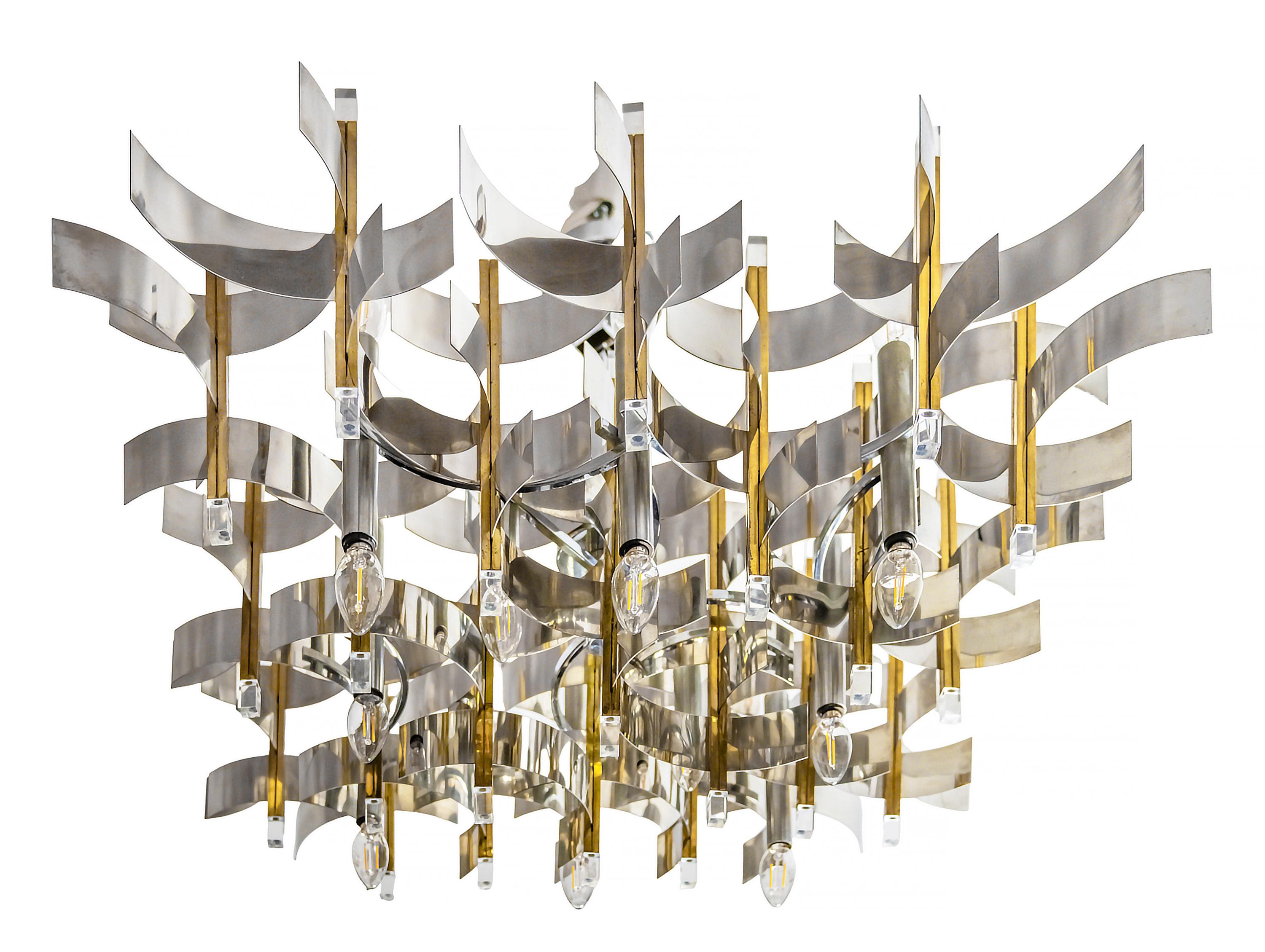 Italian midcentury chrome, brass and plexiglass chandelier designed by Gaetano Sciolari in 1970s.
The design of this chandelier is made in chrome half-round elements with brass stripes and plexiglass on their top and bottom. 
This chandelier