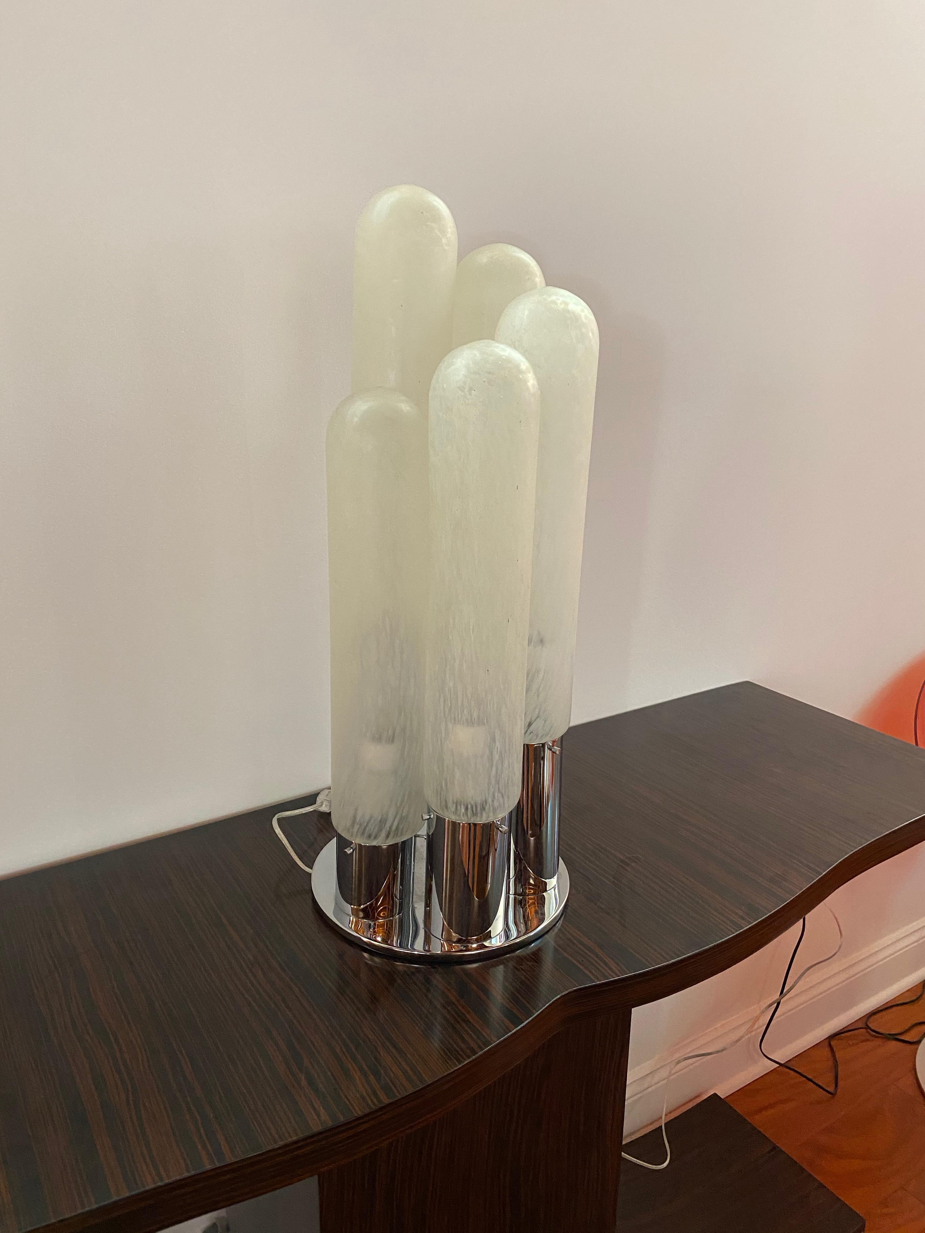 Mid-Century Modern Italian table lamp. Having a chrome base with five oblong glass shades. Each glass shade measures 16 inches in height. Has been rewired for American use with five medium base sockets.