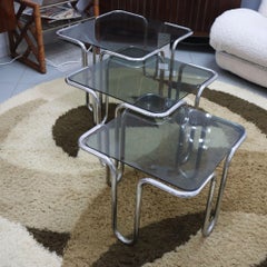 Mid-century italian coffee tables in smoked glass and chromed metal, set of 3
