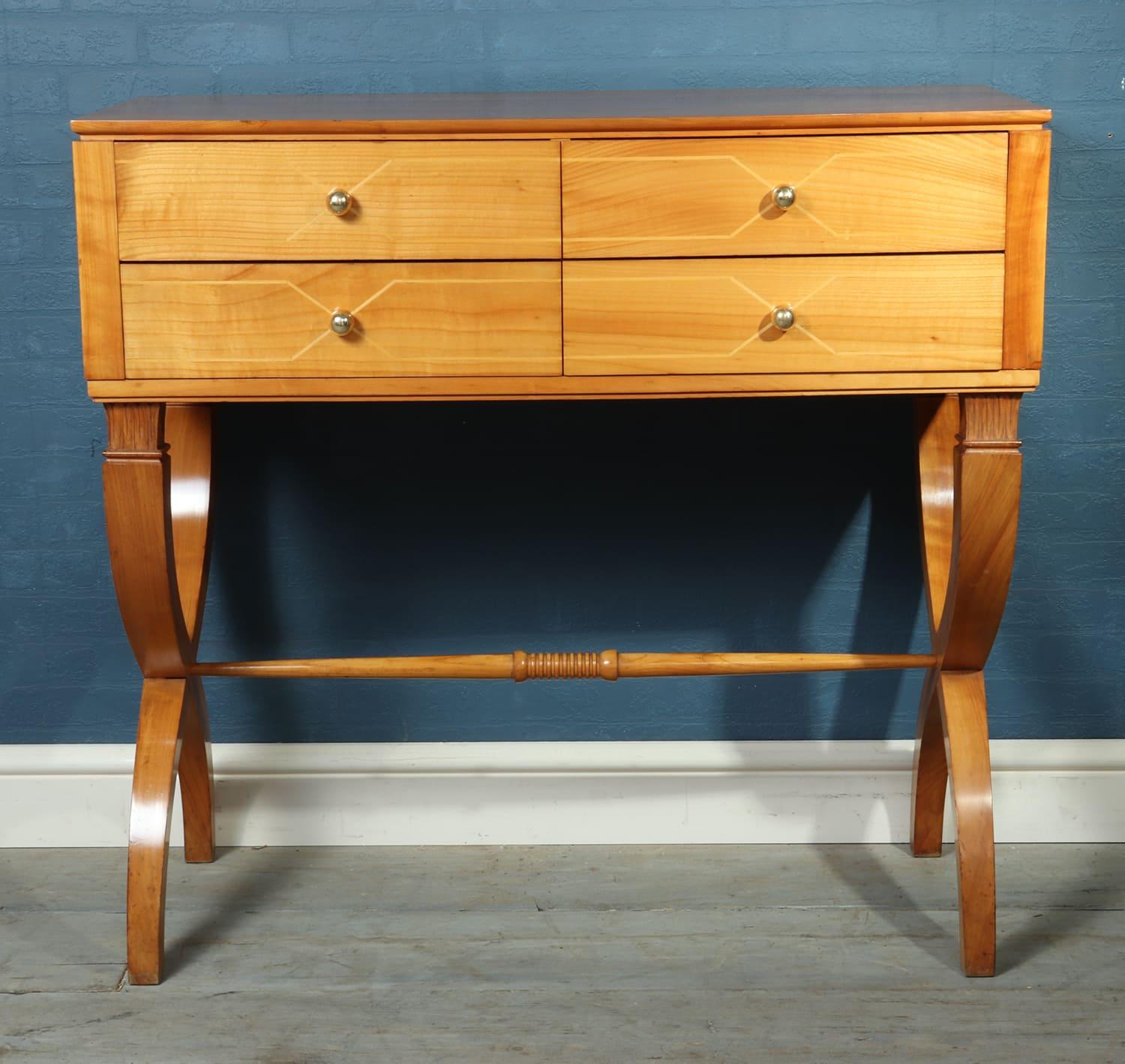Mid century Italian commode in solid cherry

This commode chest of drawers on stand is of Italian Design from the 1950’s with strong attributions to Paolo Buffa. The Chest is produced in Solid cherry it has four drawers each with dovetail joint