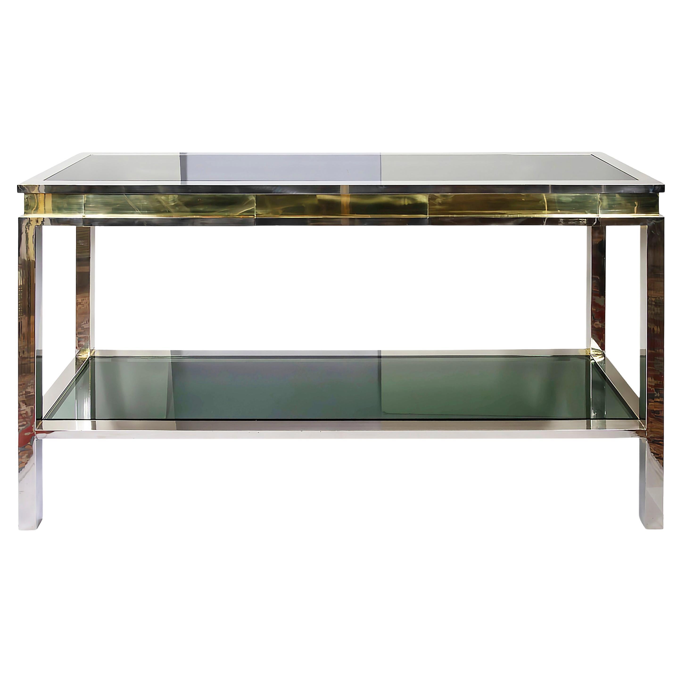 Mid-Century Italian Romeo Rega/Willy Rizzo style console table made of chrome and brass with black/smoky glass top, lower shelve and two drawers.
It is very heavy and solid, very good condition.