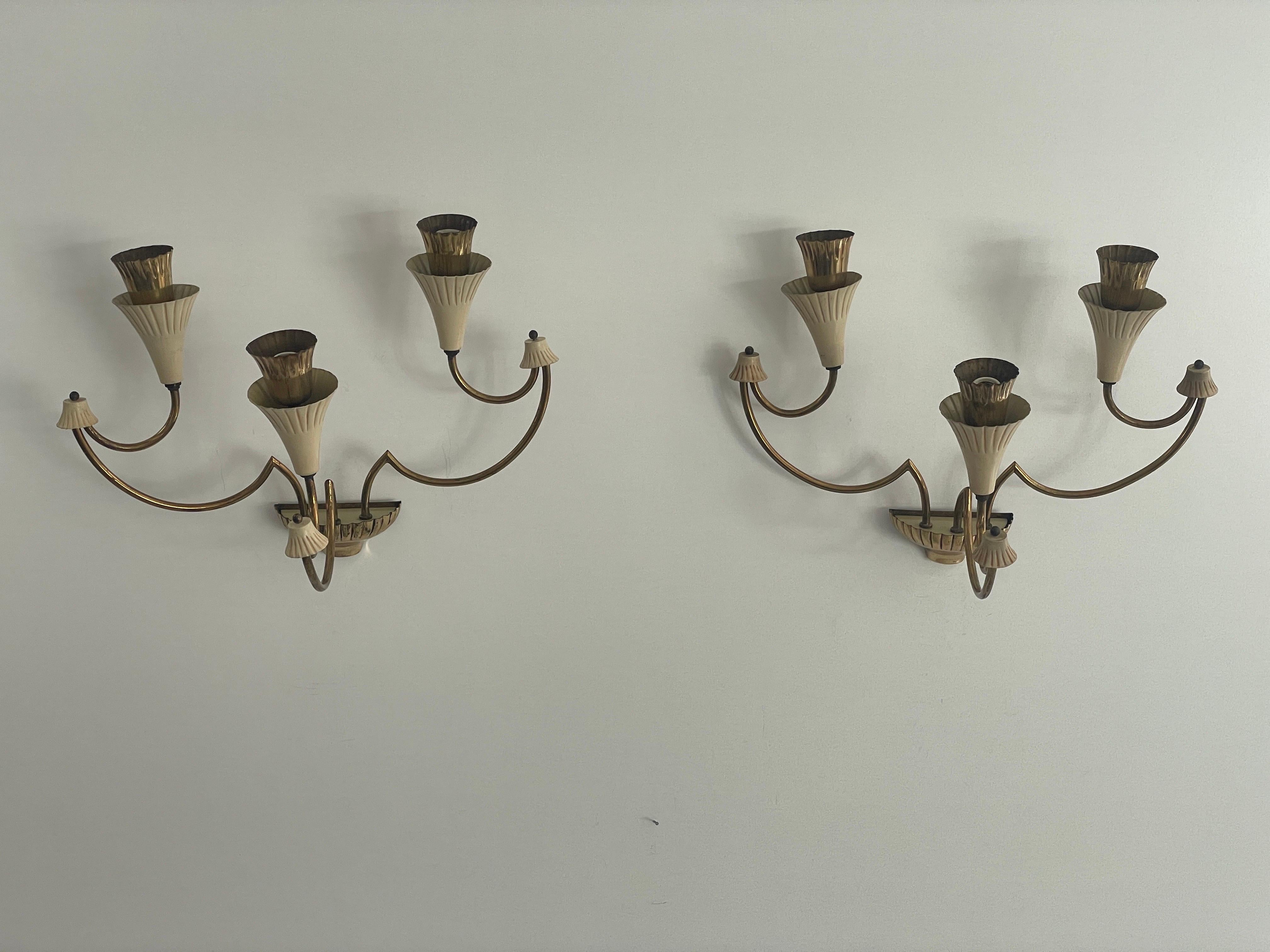 Pareja de candelabros Sputnik de 3 brazos de diseño italiano de mediados de siglo, años 50, Italia

Elegantes apliques raros de alta calidad.

Las lámparas están en muy buen estado vintage.
Desgaste propio de la edad y el uso

Estas lámparas