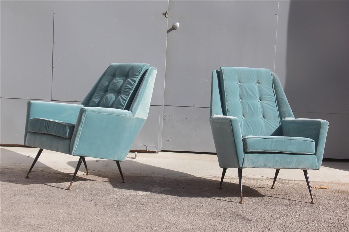 Midcentury Italian design pair armchairs Avion blue brass feet, 1950s.
Lined with cornflower blue velvet, elegant and very comfortable indeed.

Geometric and rational shapes, very reminiscent of the style of Gio Ponti.