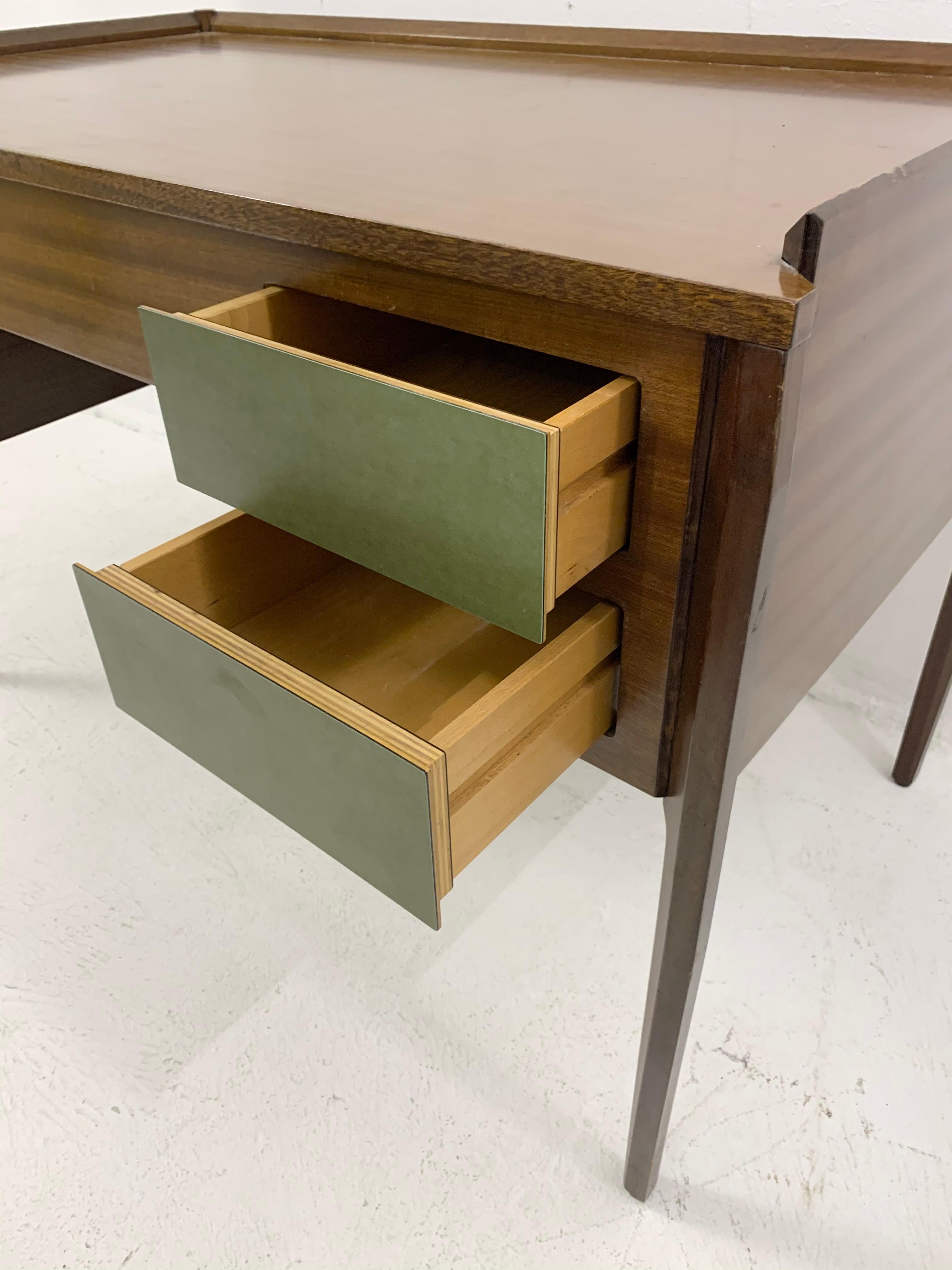 green desk with drawers