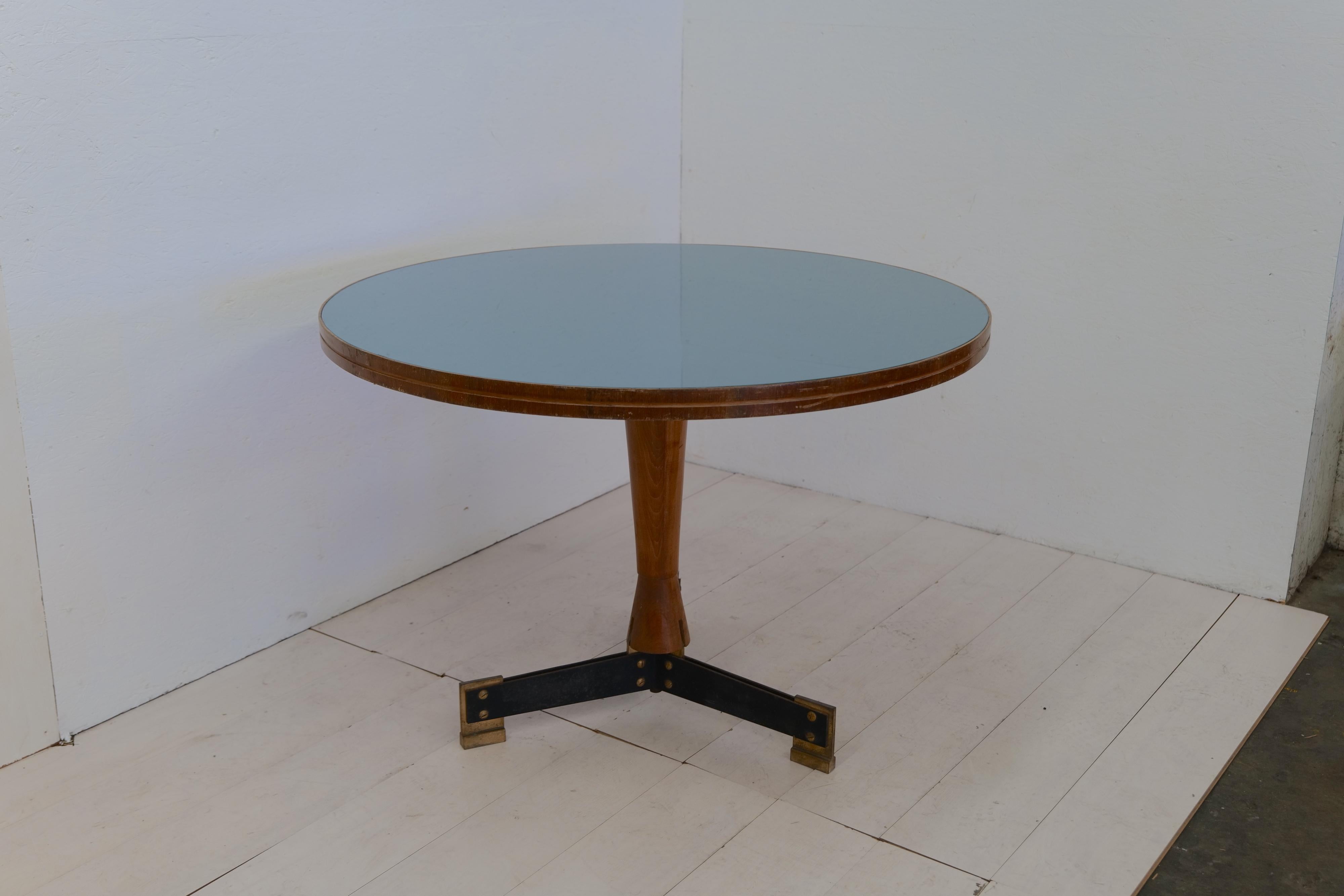 The midcentury Italian dining table by Ignazio Gardella, crafted in Italy during the 1950s, is a testament to timeless design and exceptional craftsmanship. Designed by Ignazio Gardella, a renowned Italian architect, this dining table showcases
