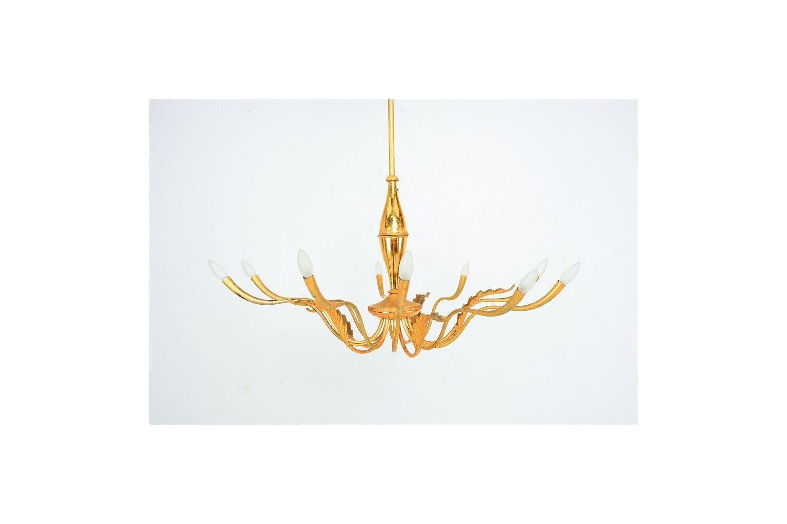 
Fabulous Sculptural Ten-Arm Chandelier in the style of Guglielmo Ulrich.
Unmarked
H 42 in. x Diameter 40 in.
Item is rewired and ready to go.
Chandelier has original vintage patina
Expect vintage wear.
Requires E-14 bulbs they are not