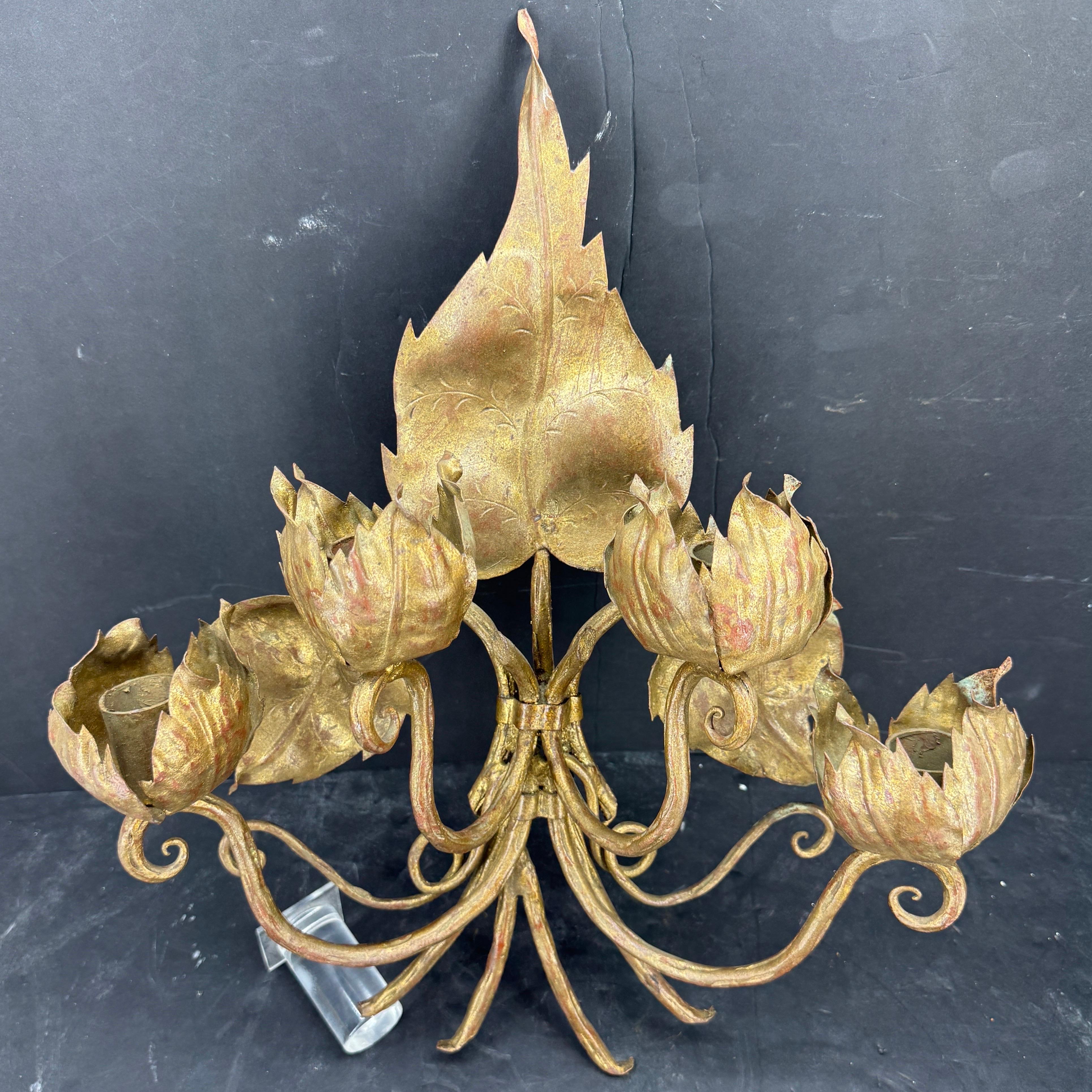 Mid-Century Modern candle sconce from Italy that is shaped like flowers. Perfect enhancing a hallway, dining room, living room or bedroom. Quite unique, this candle wall sconce is a charming addition to any home. 

