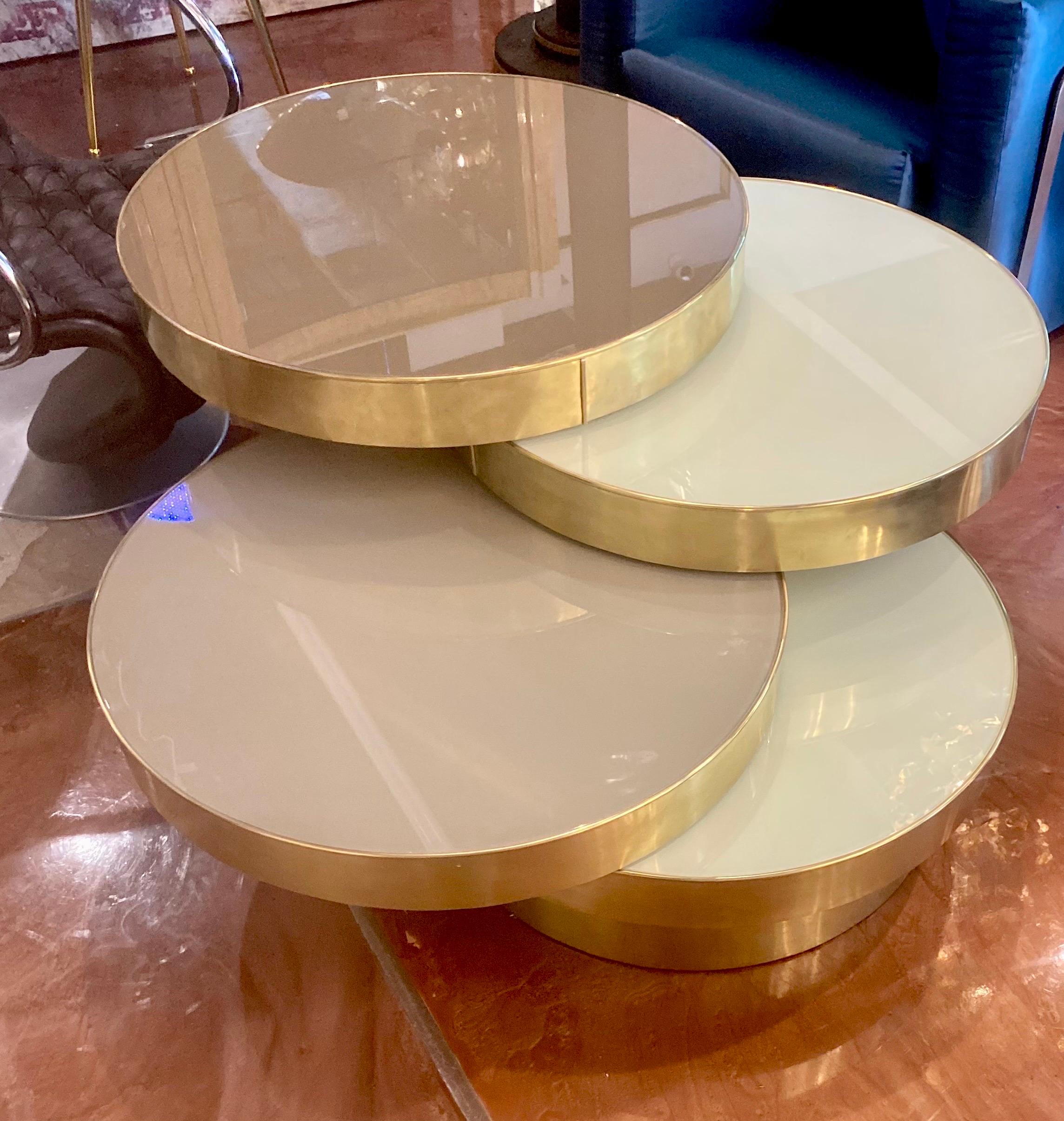 Beautiful 4 Tiered Multi-Level Reverse Painted Glass with Brass Base and Trim Italian Mid-Century Coffee Table. The Closed Tiers Measure 30.5 inches  in Diameter and 20.5 inches in Height. When Fully Open  the Width is 55 inches. 