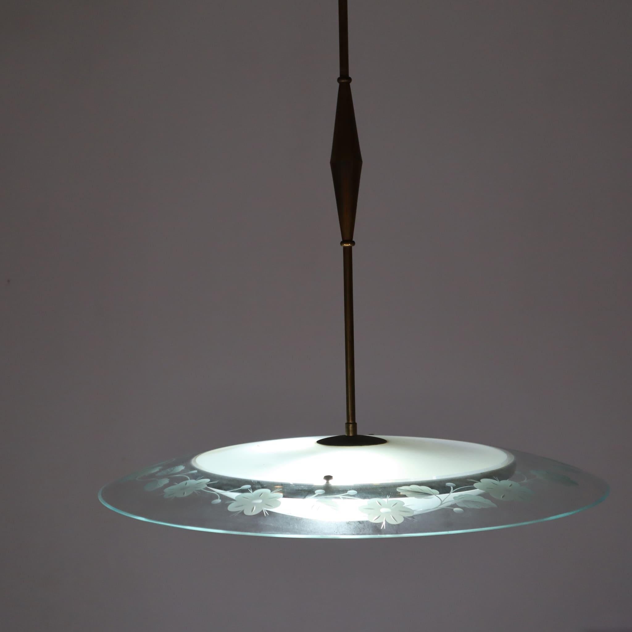 Mid-century italian glass chandelier by Pietro Chiesa Fontana Arte Italy 1950s
This chandelier was produced in Italy in the 1950s, embodying the charm and excellence of Italian craftsmanship from that period. Its authenticity is evident in its