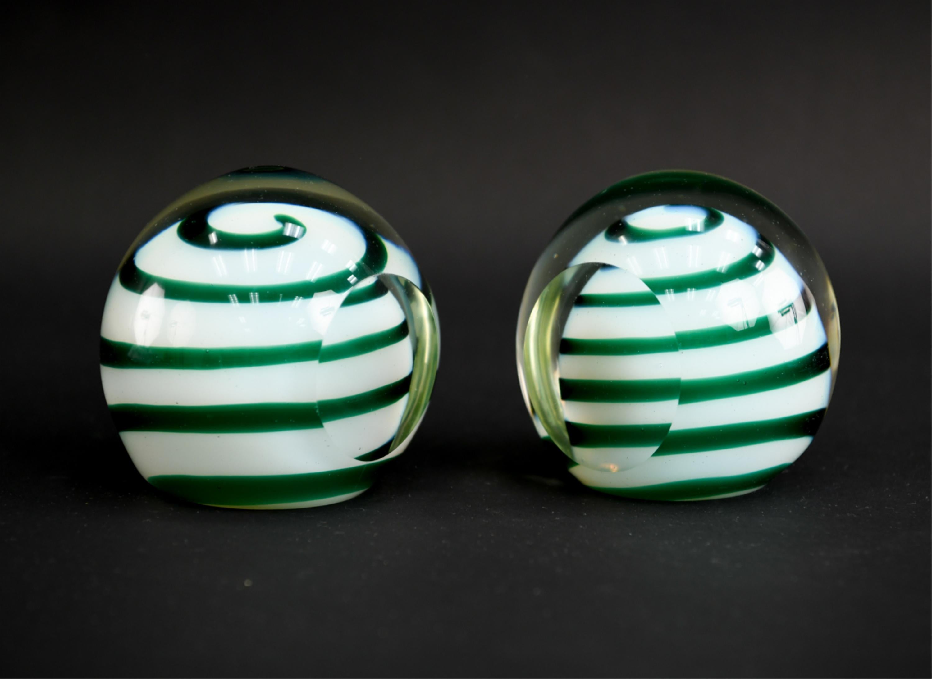 A fun pair of midcentury Italian swirled art glass bookends in green and white.