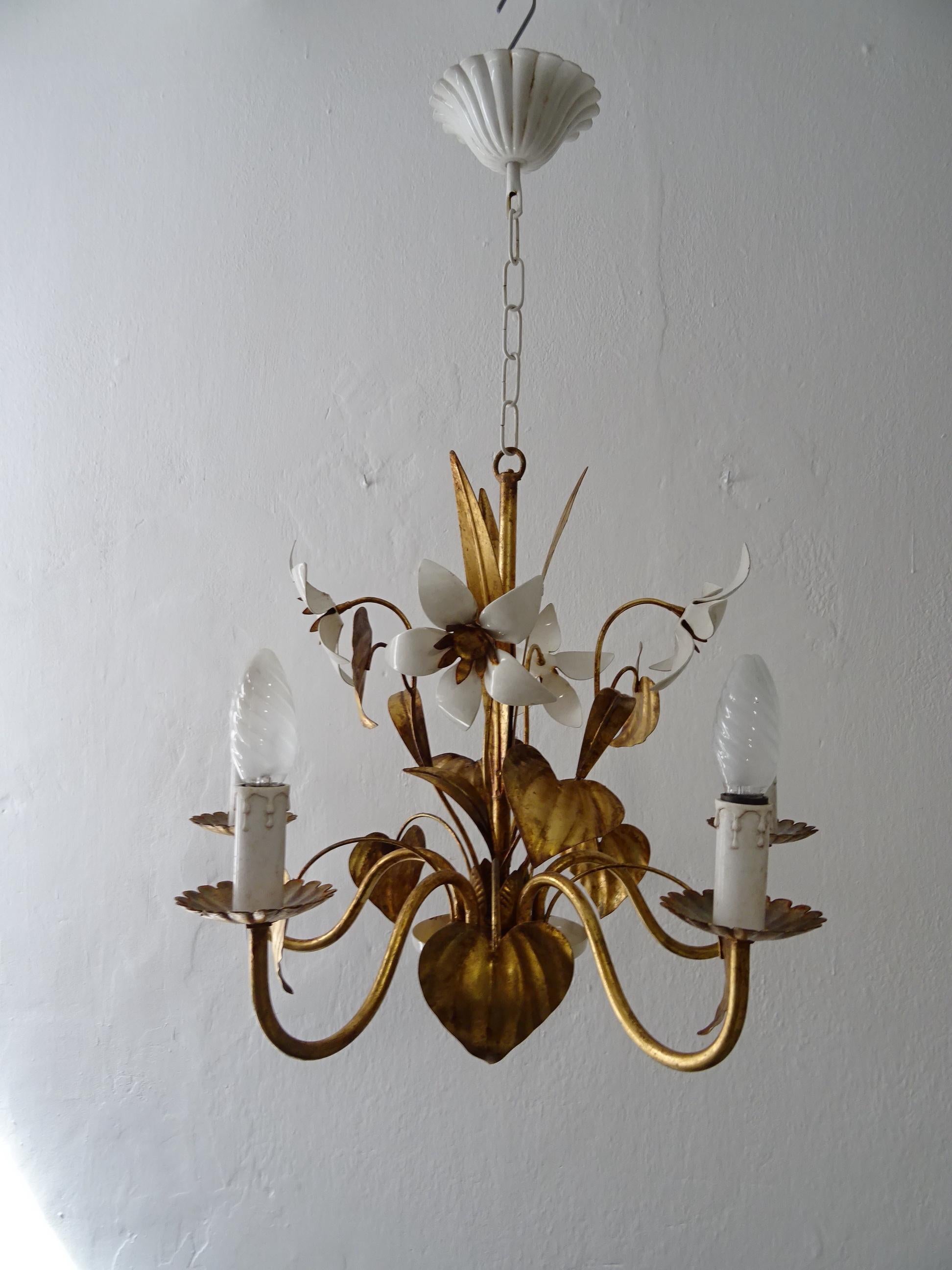 Housing 5 lights. Will be rewired with certified US UL sockets for the USA and appropriate sockets for all other countries. Flower Hollywood regency chandelier. Original white and gold paint. Great patina on the gold. Free priority UPS shipping from
