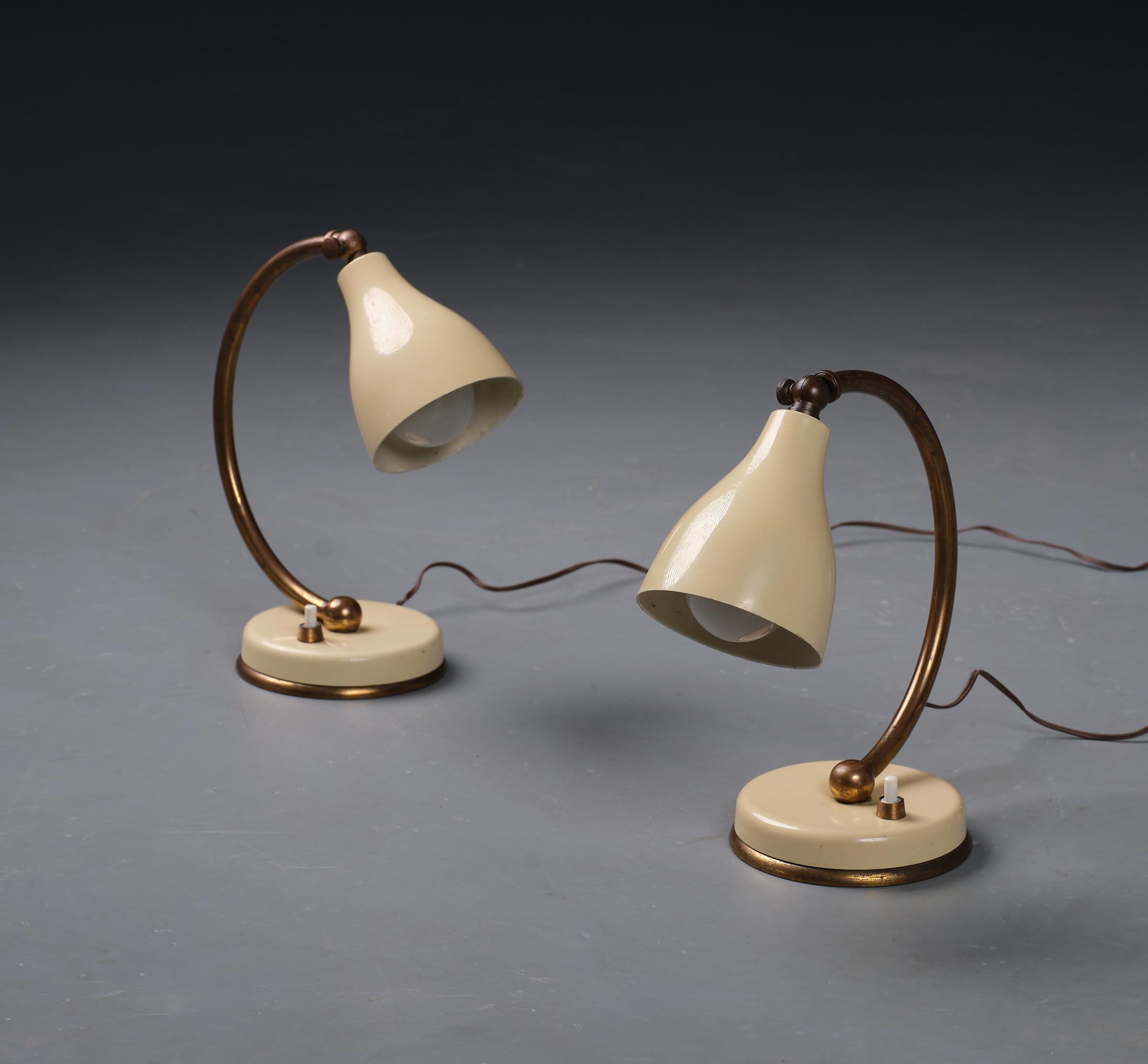 Mid-20th Century Mid-Century Italian Grace: Adjustable Cream and Brass Table Lamps For Sale