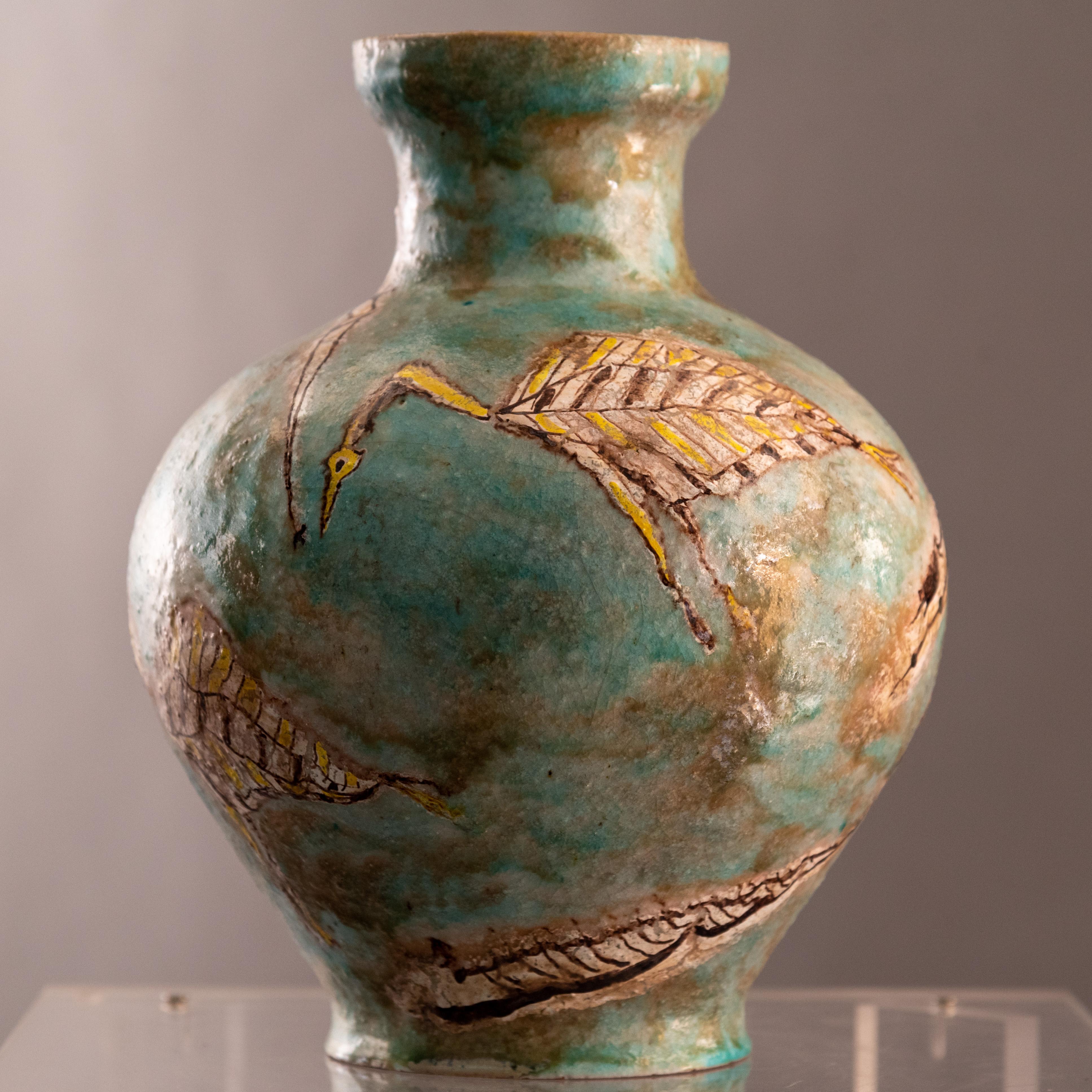 Stoneware vase with green-gray background glaze and patterns primarily in browns and yellows. Zauli Faenza Reference number AG001160CZ from the general archive of the artist Claudio Zauli 

This artwork, never before on the market, comes from an