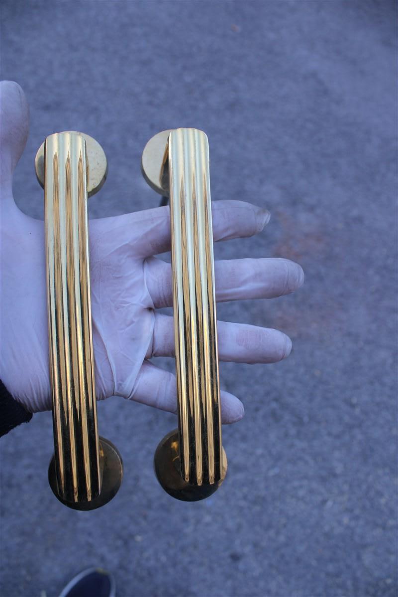 Mid-century Italian handles in solid brass rational minimal design gold.