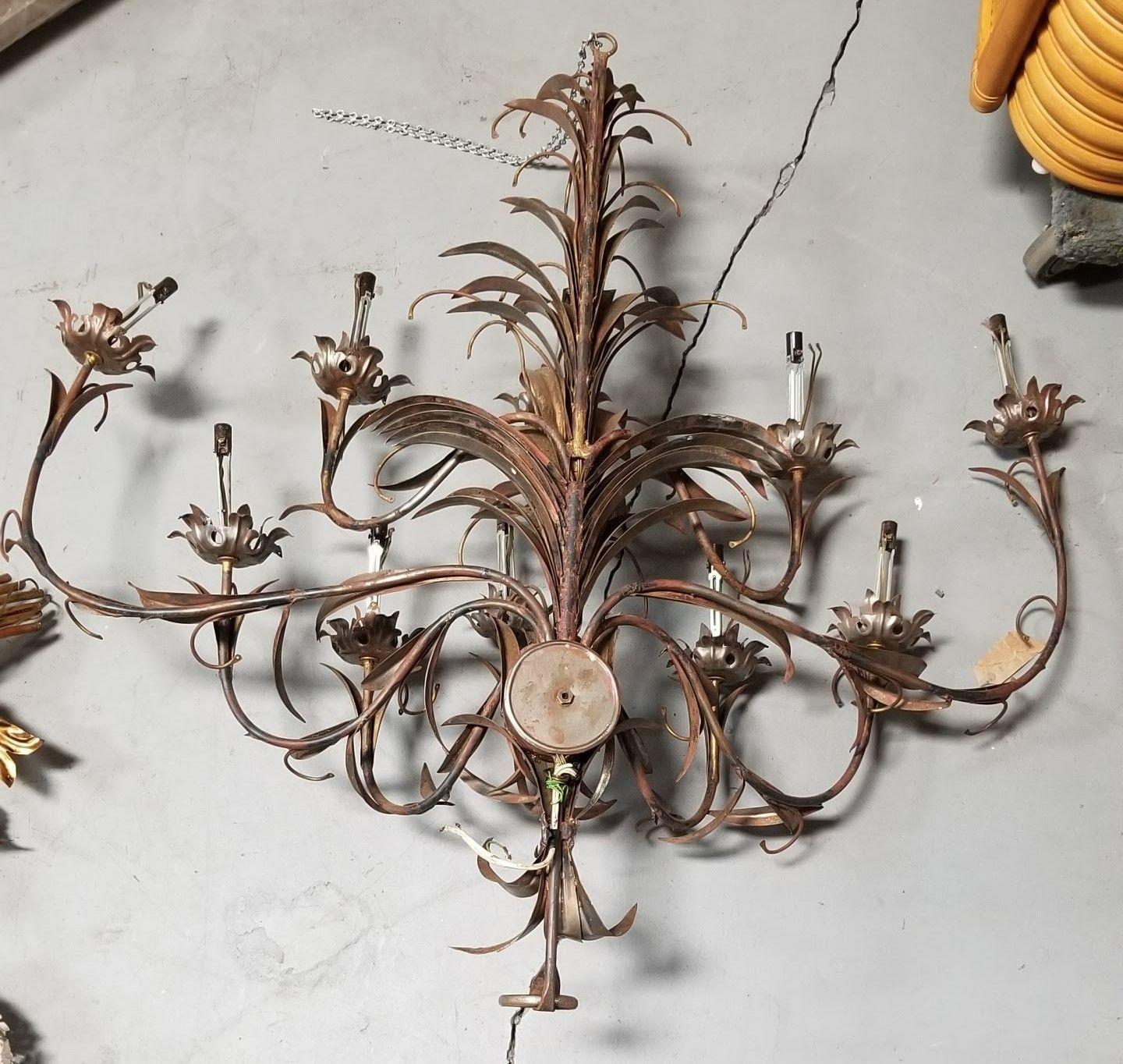 1950s Italian Hollywood Regency-styled wall candelabra centerpiece sculpture.

Cords have been cut, this piece is for decoration only.

A stunning Italian ornate sconce, a true vintage gem from the mid-century era. This exquisite piece features