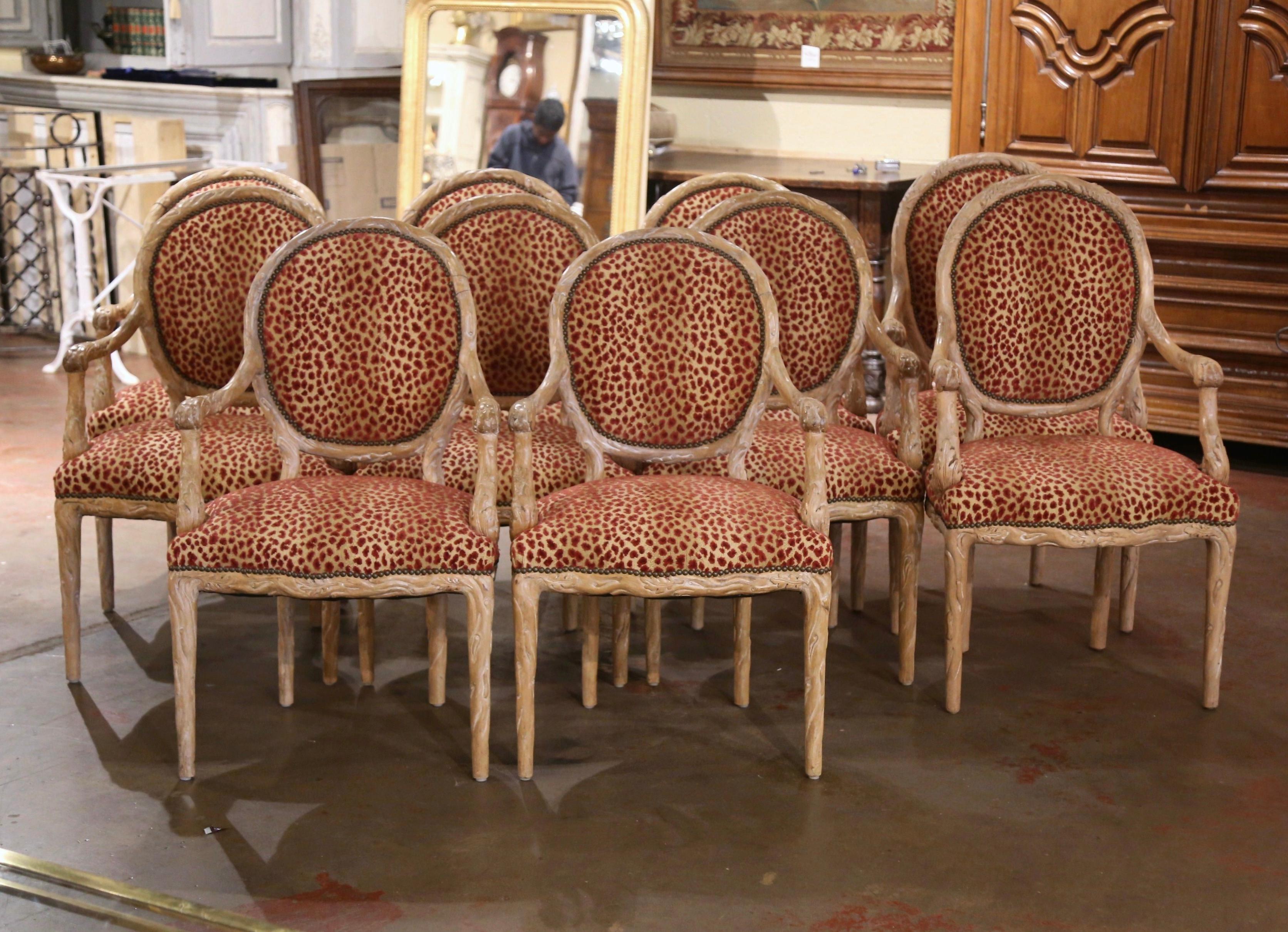 Dress your dining table with this elegant suite of antique dining chairs. Crafted in Italy circa 1960, the set includes eight armchairs and two slightly larger ones for host and hostess, offering both style and comfort. Each chair features