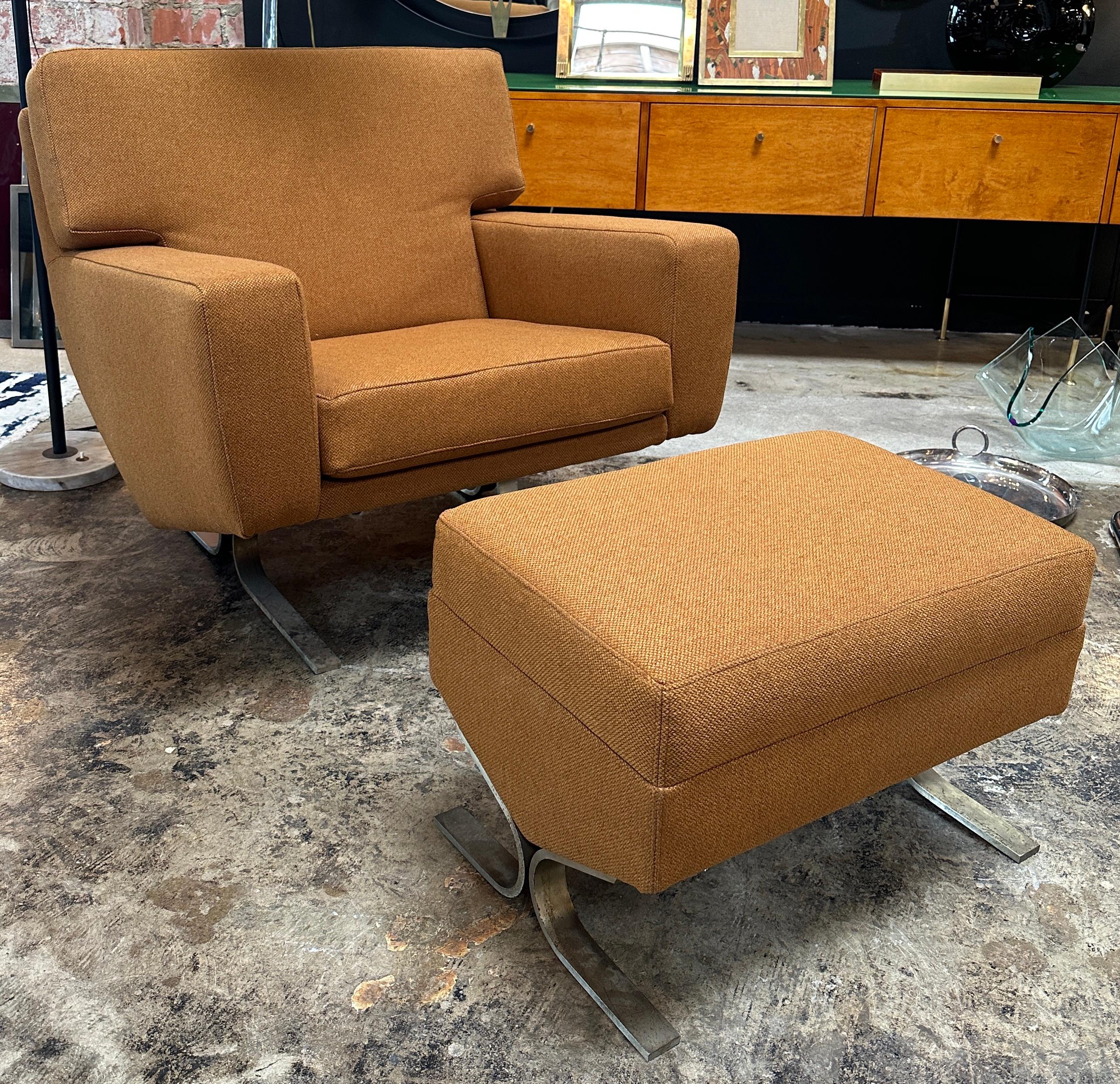 The midcentury Italian Lounge Chair and Ottoman designed by Franco Campo X F.lli Saporiti is a stylish and comfortable piece of furniture. It features a chrome base, which adds a sleek and modern touch to the design. The original orange fabric