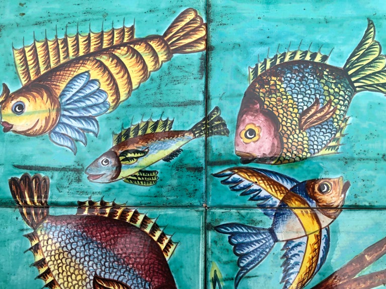 Mid century colorful set of 12 tiles in a wall panel signed Marrazi Sassuolo Italy.
Differents kind of fishs, a spiny lobster, one crab and seaweeds.
Mediterranean scene.
Measures: Height / 17.3 inches.
Lenght / 23.3 inches.
Founded in 1935, in