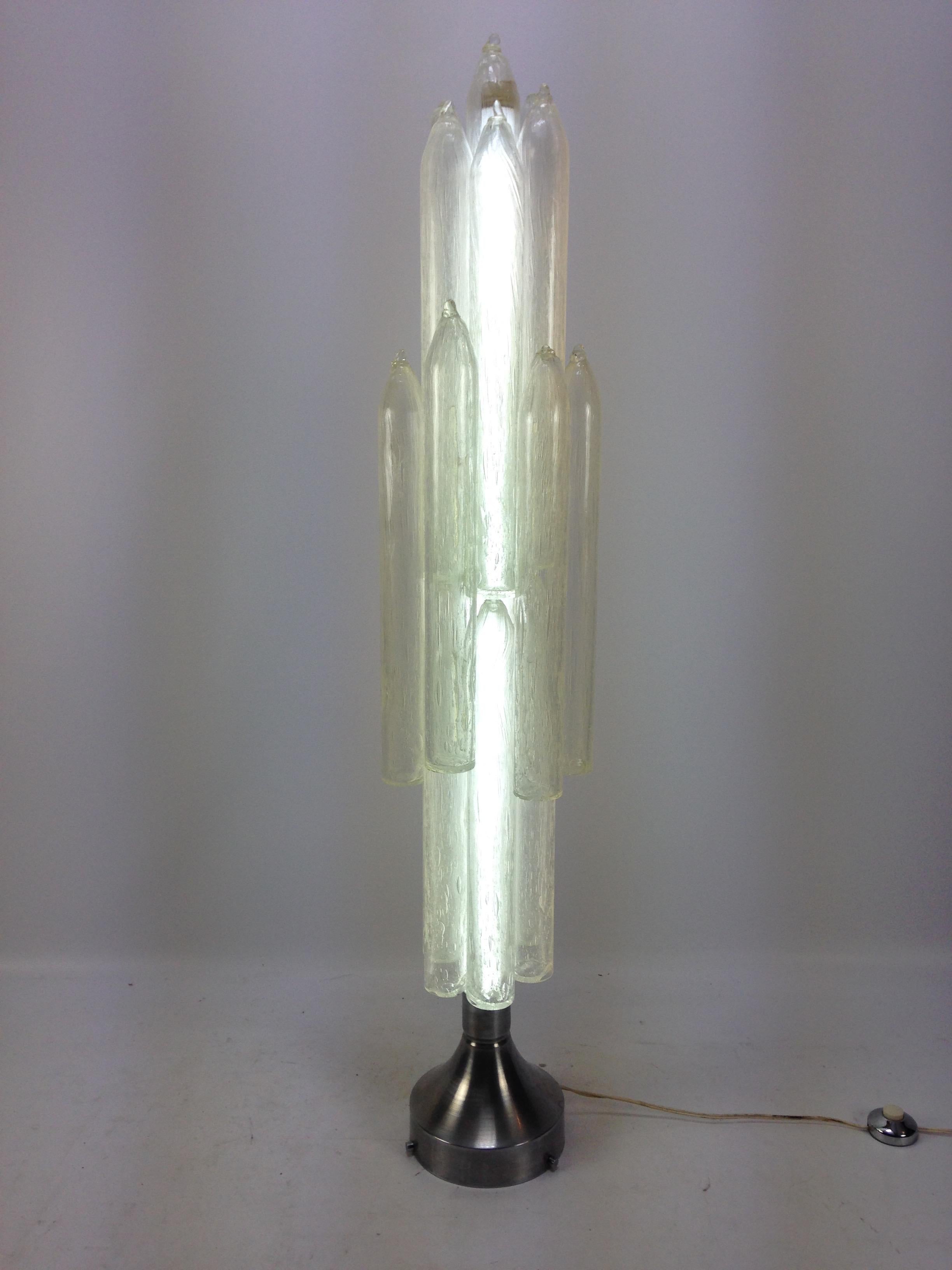 Very rare and decorative Mazzega Murano glass lamp attributed to Carlo Nason from the Mid-Century Modern Space Age period. 
Italy, 1960-1970.

Handblown Mazzega glass cylinders joined together with space rocket shape creating an amazing