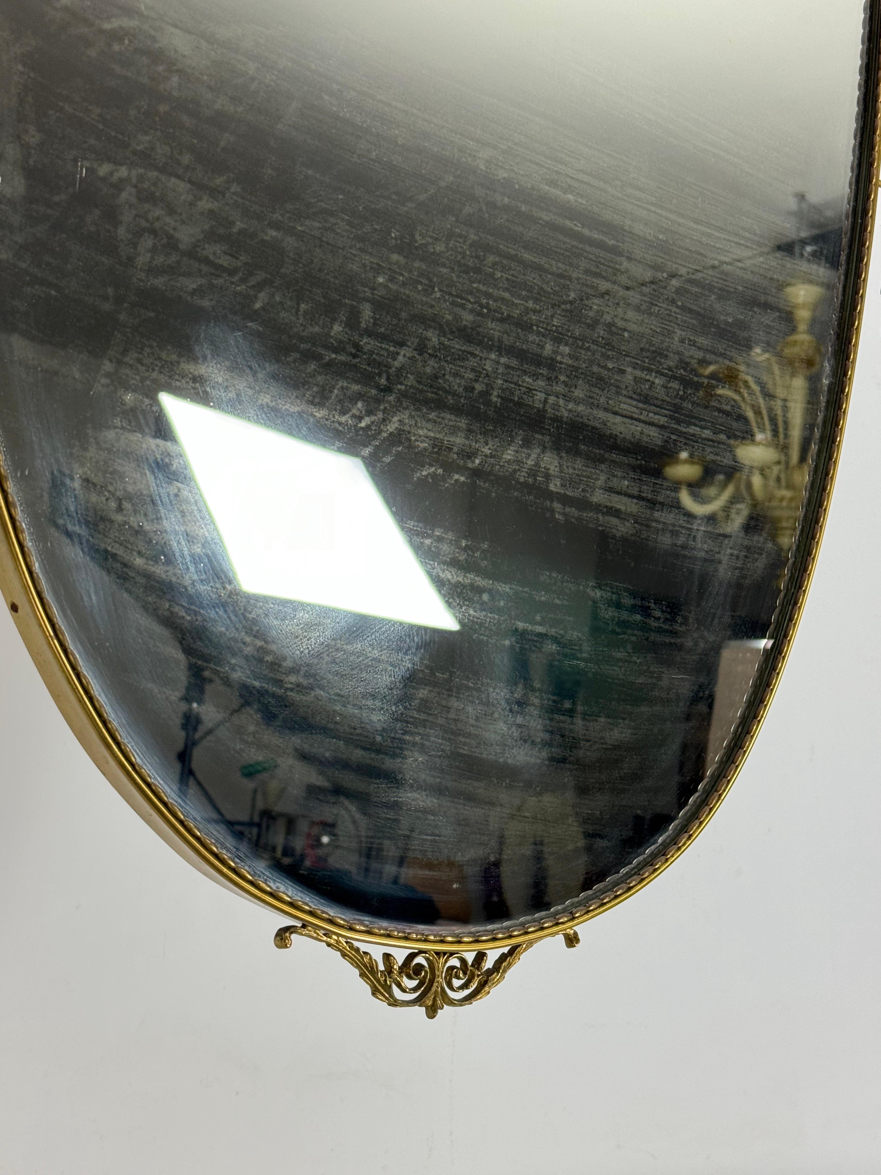 Brass Mid-century Italian mirror in brass. Italy 1950s For Sale