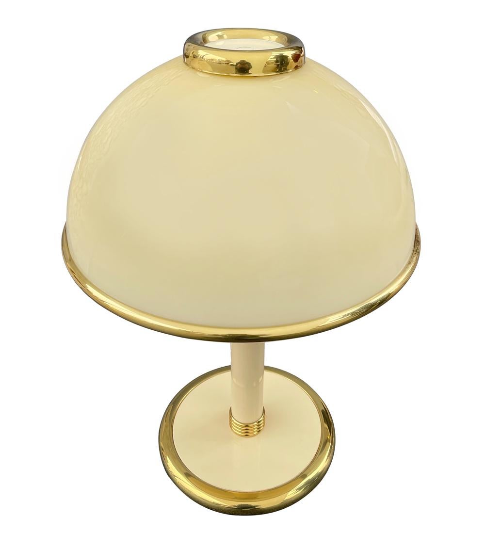 Glass art lamp with tan Mazzega glass in a mushroom form. It features brass trim detailing. Wiring is excellent and fully working.