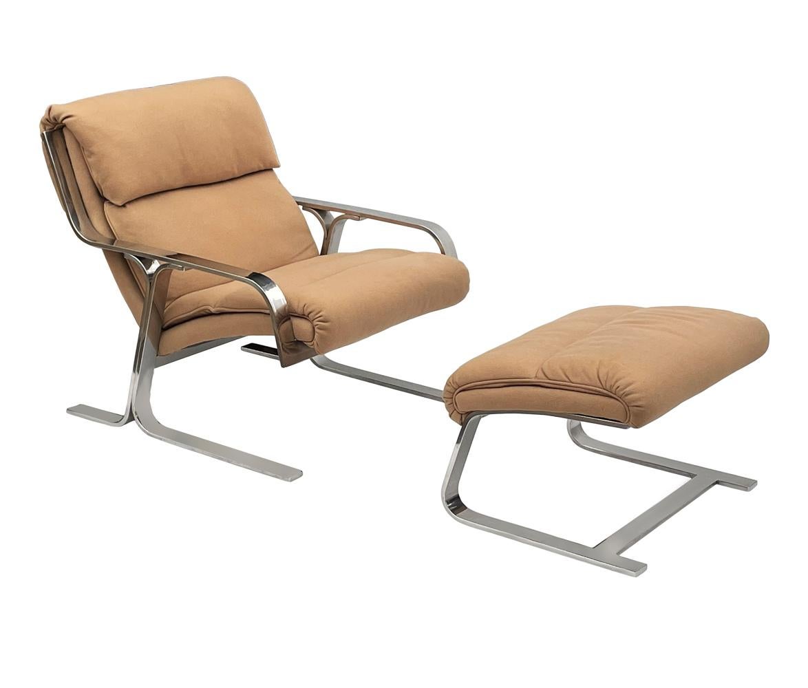 A very well made lounge chair and ottoman from Italy circa 1970's. It features a solid chrome flatbar frame with tan fabric. The fabric is original so recovering is recommended.