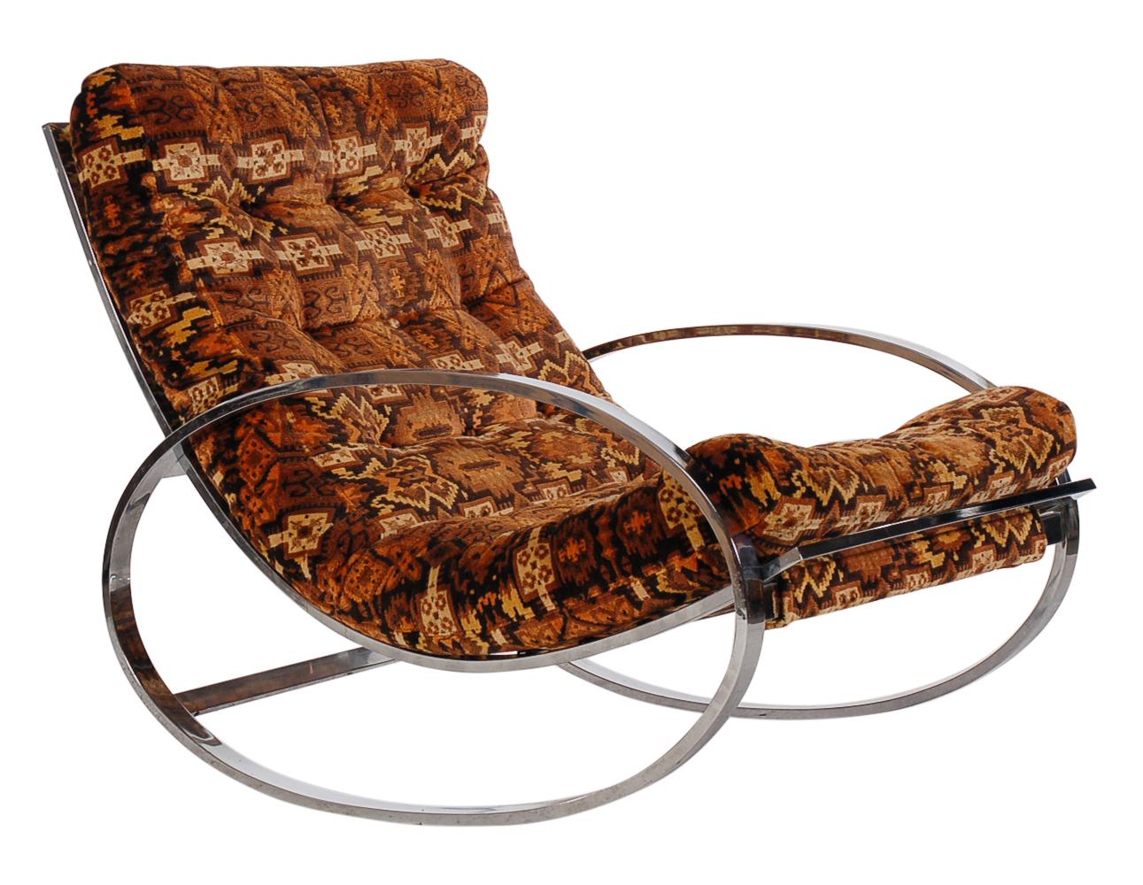 All original set designed by Renato Zevi and produced by Selig in the early 1970s. The set consists of heavy polish chrome frames, with the original Scandinavian print upholstery. Ottoman measures H 15, W 24, D 27. Price includes chair and footrest