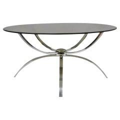 Table basse italienne moderne du milieu du siècle dernier, base en acier chromé et plateau rond en verre