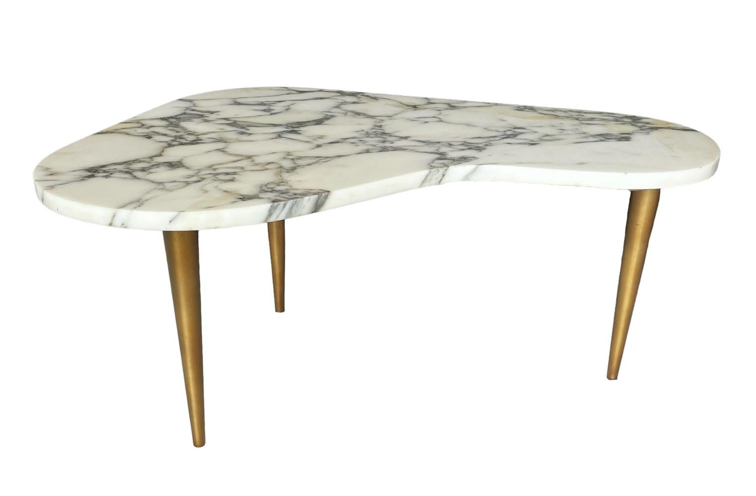 A fine vintage side table from Italy circa 1960's. It features a kidney shape Arrabesco marble top with gold lacquered metal legs. Very good condition without issues. 